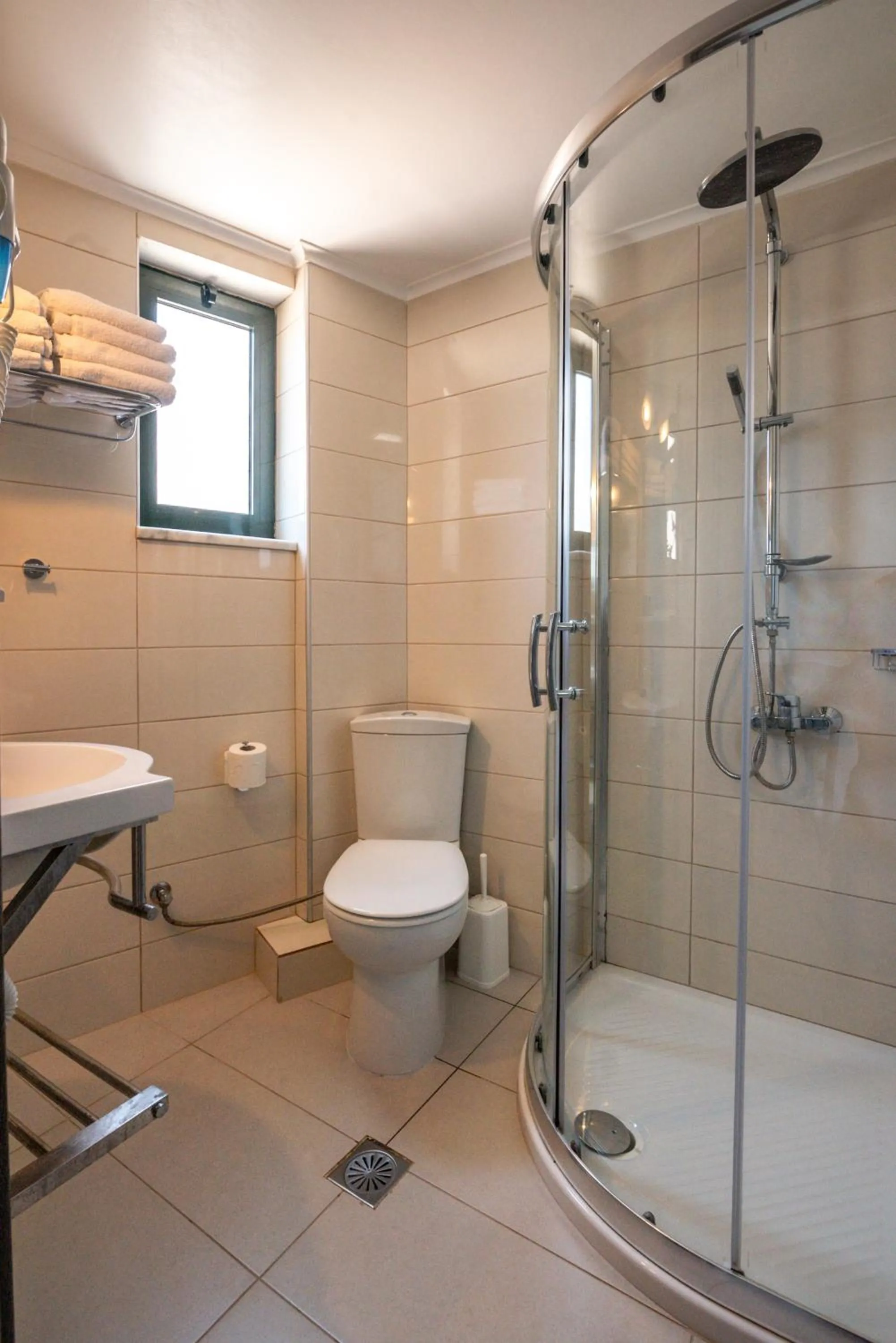 Toilet in Christina Beach Hotel