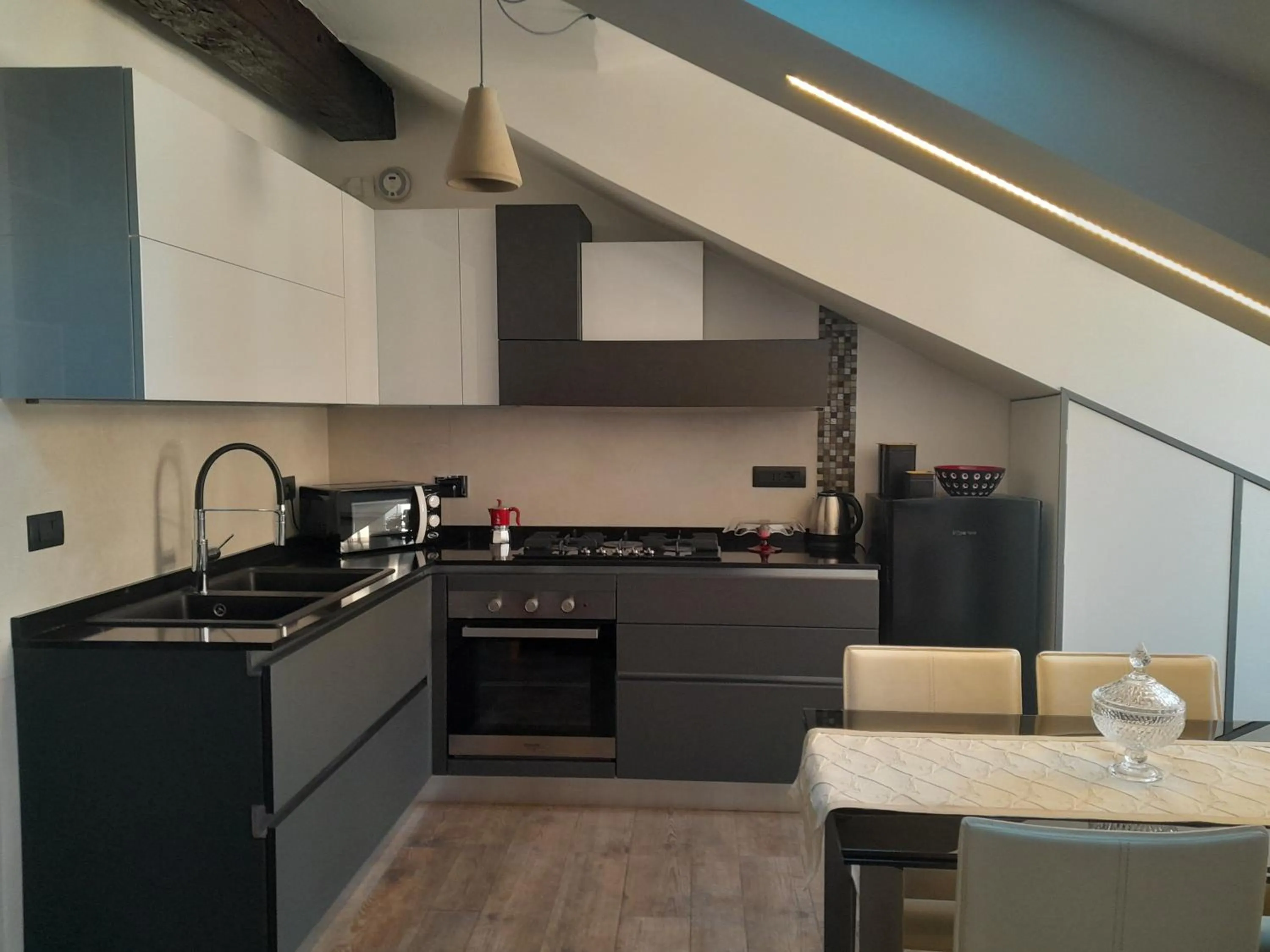 Kitchen or kitchenette in Alloggio Fronte Egizio