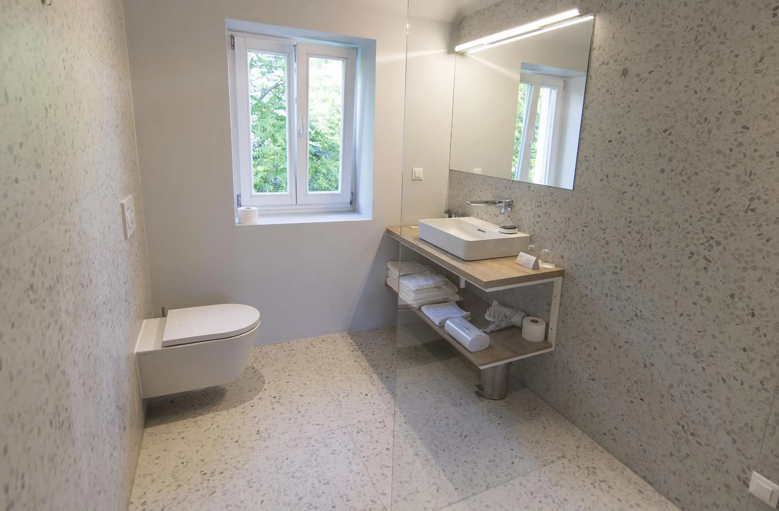 Bathroom in Divota Apartment Hotel