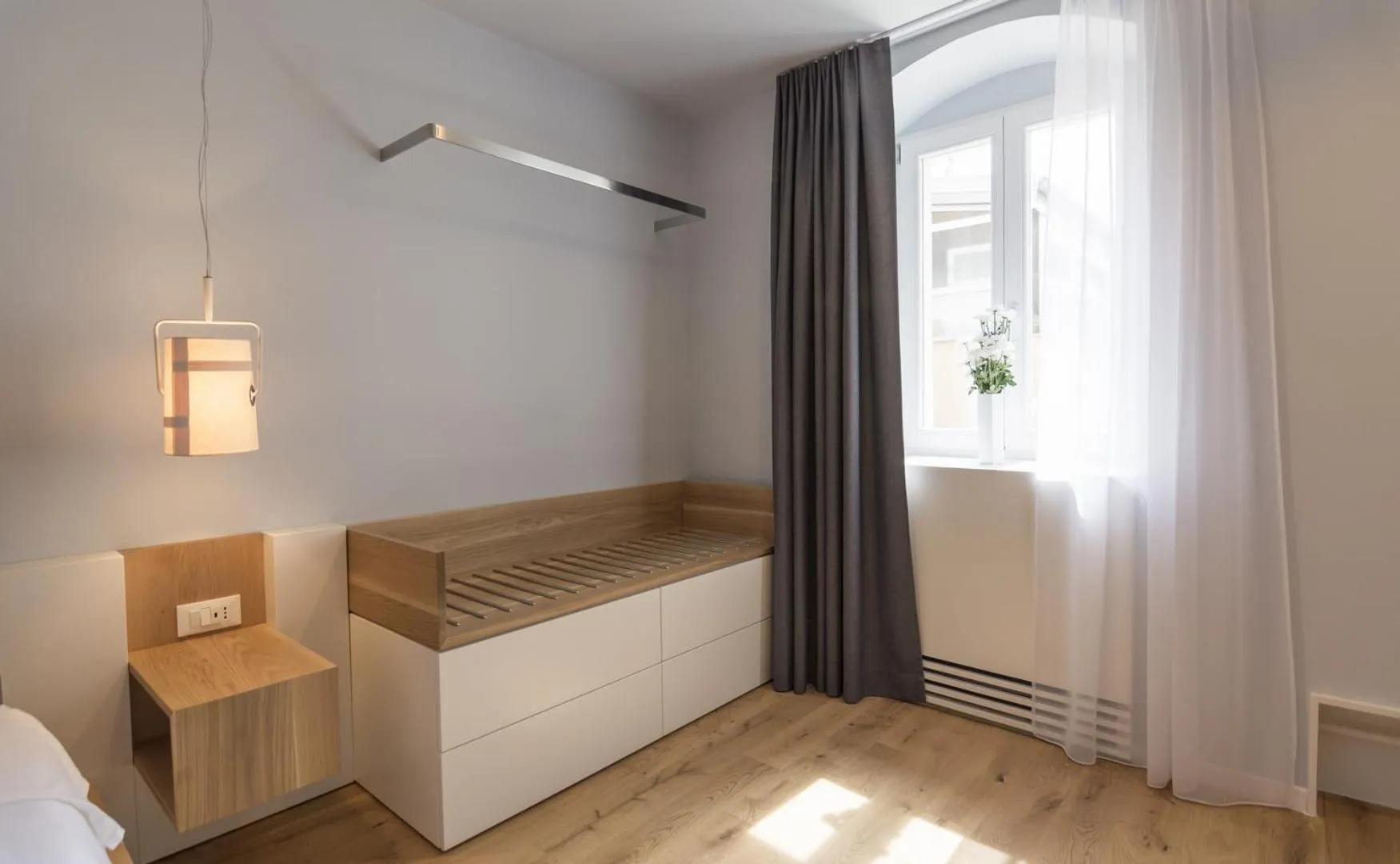 Bed in Divota Apartment Hotel