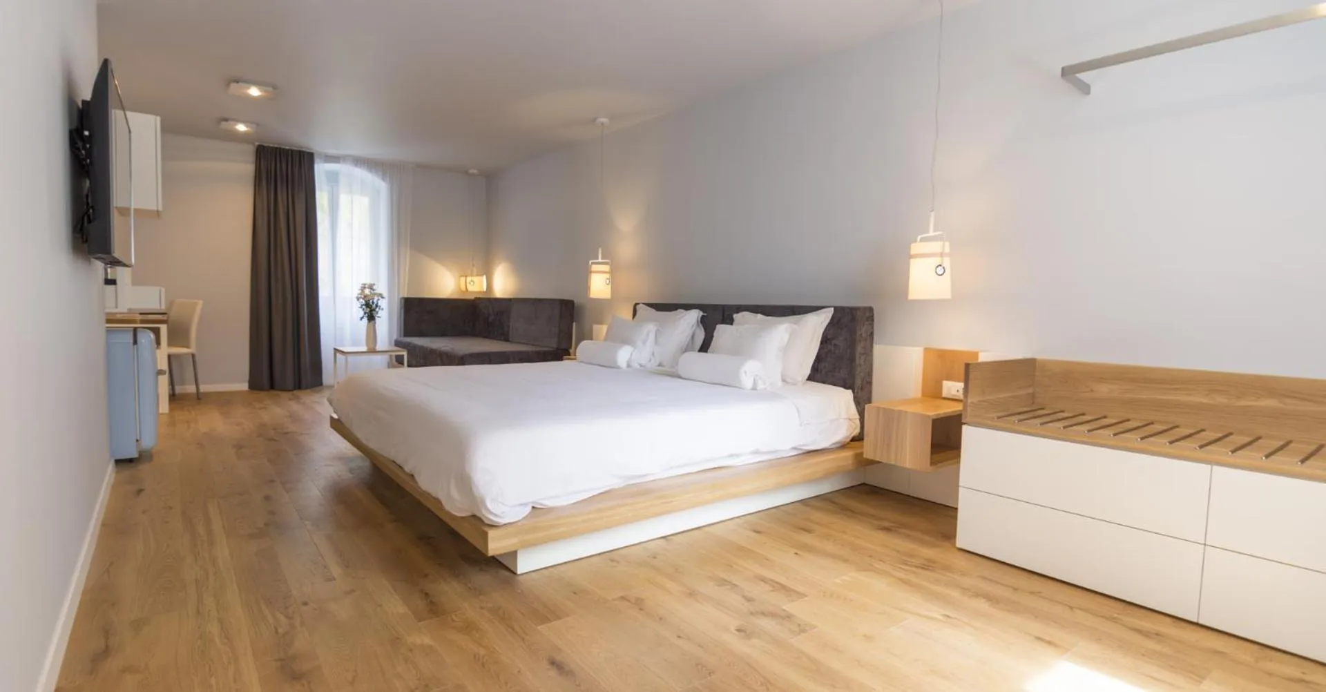 Seating area, Bed in Divota Apartment Hotel