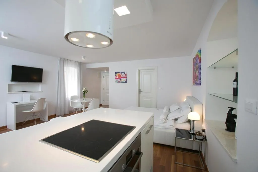 Bed in Divota Apartment Hotel