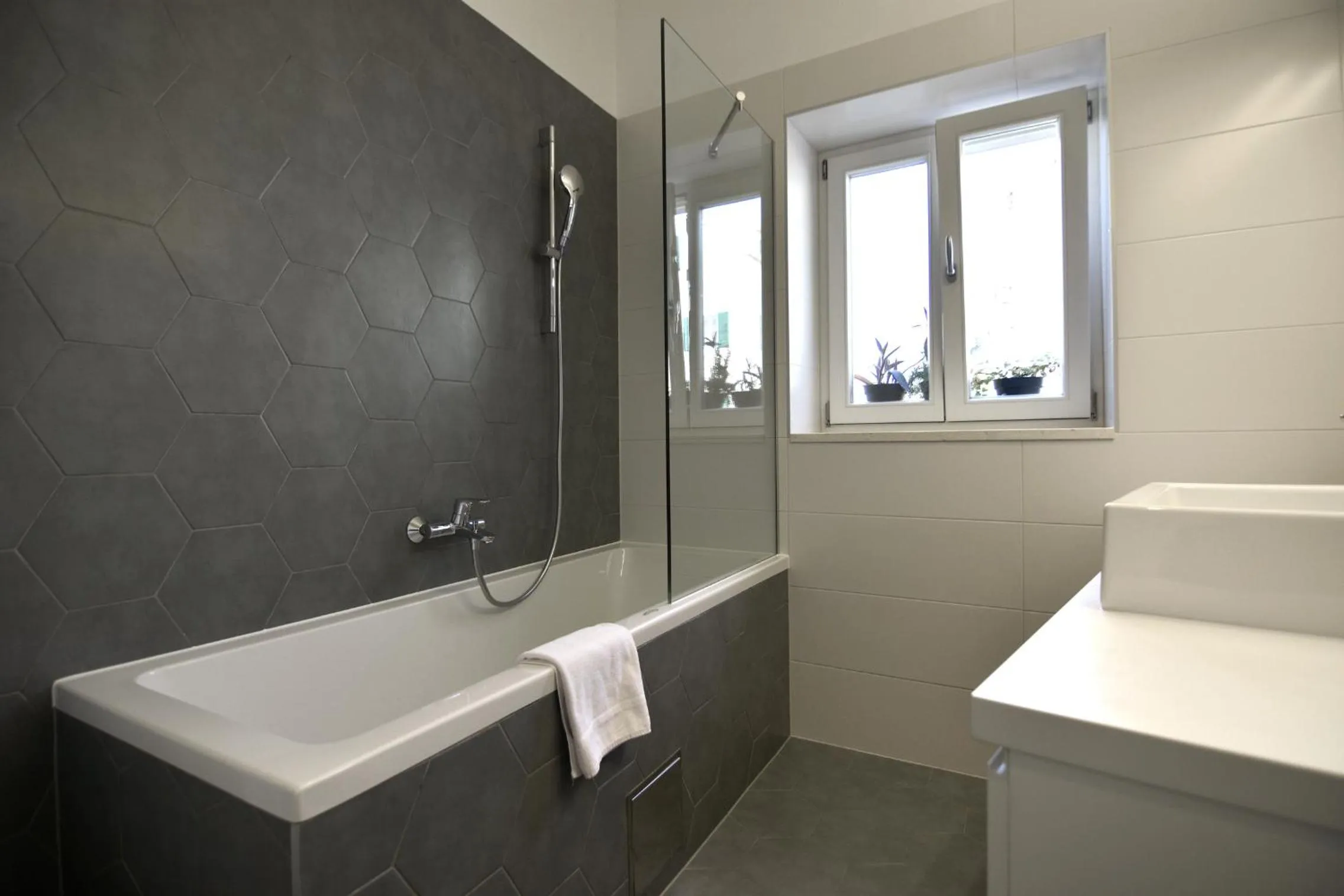 Bathroom in Divota Apartment Hotel