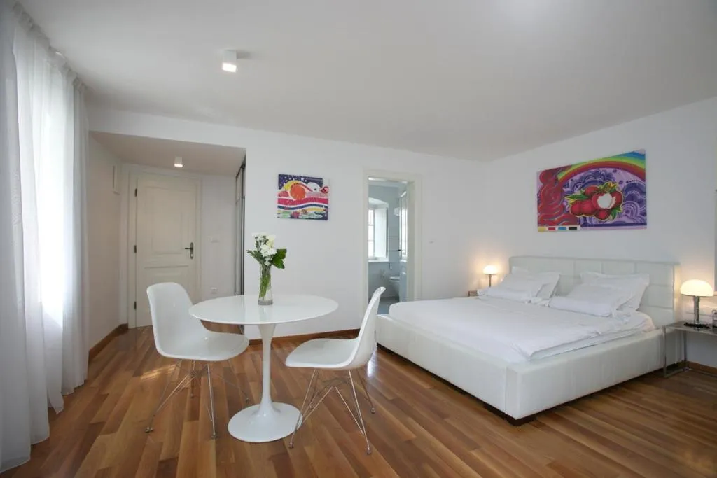 Bed in Divota Apartment Hotel