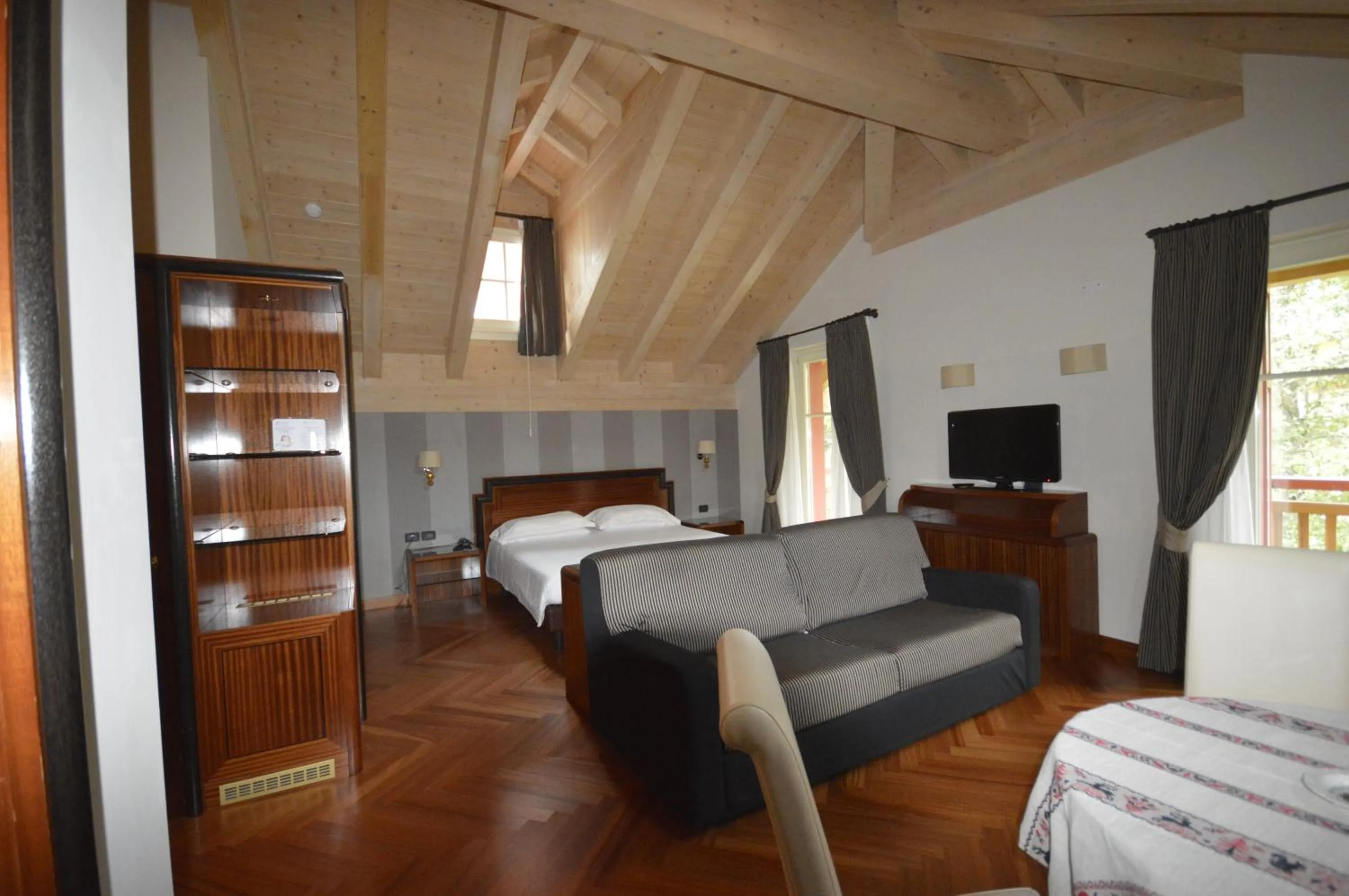 Communal lounge/ TV room in Villa Madonna