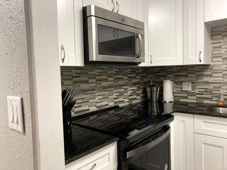 Oceanview on SAND located in Ocean Manor Resort Fort Lauderdale Beach 2 bed 2 bath spacious corner unit partial ocean view