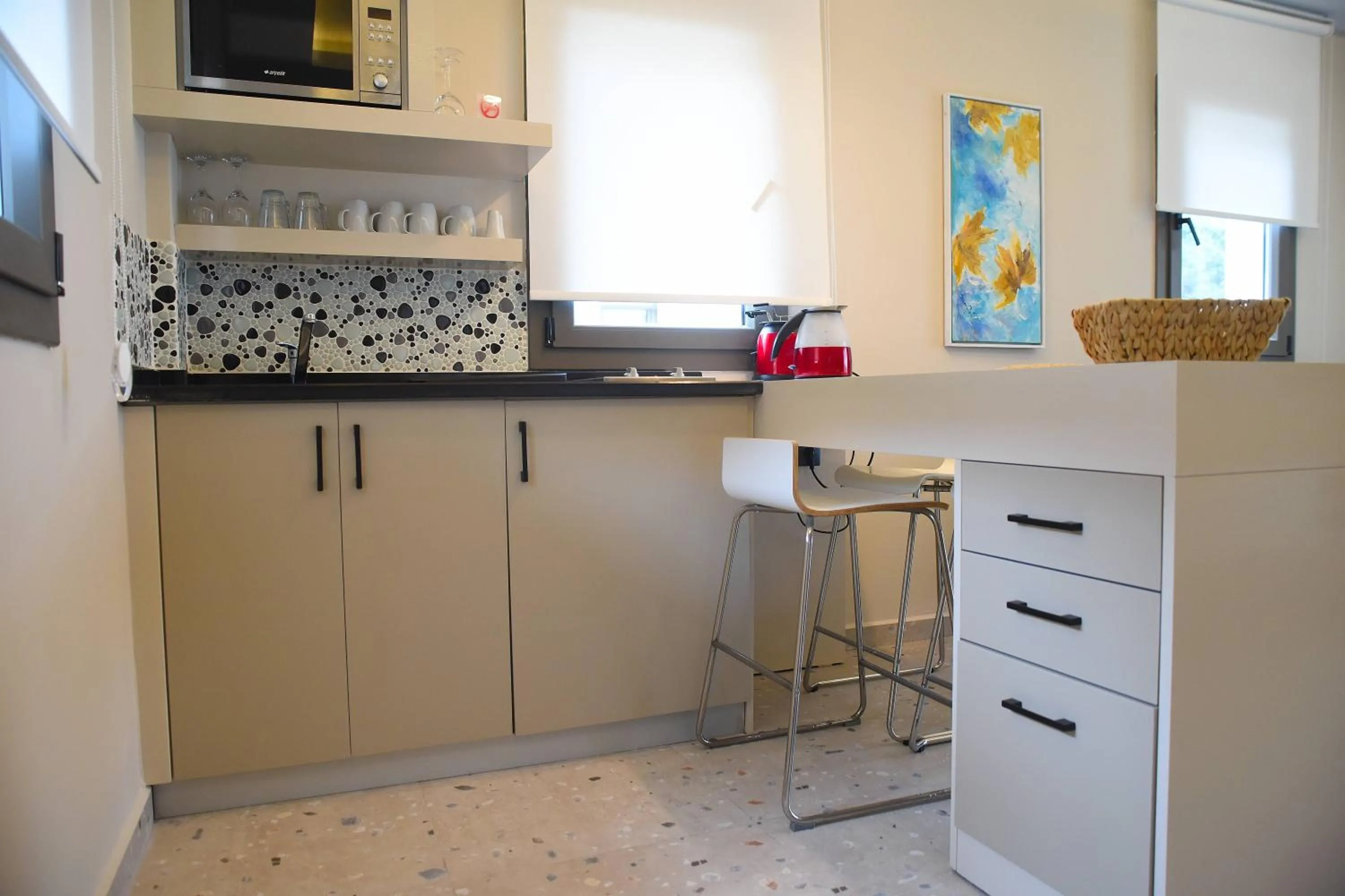 Kitchen or kitchenette in Mozaik Hotel