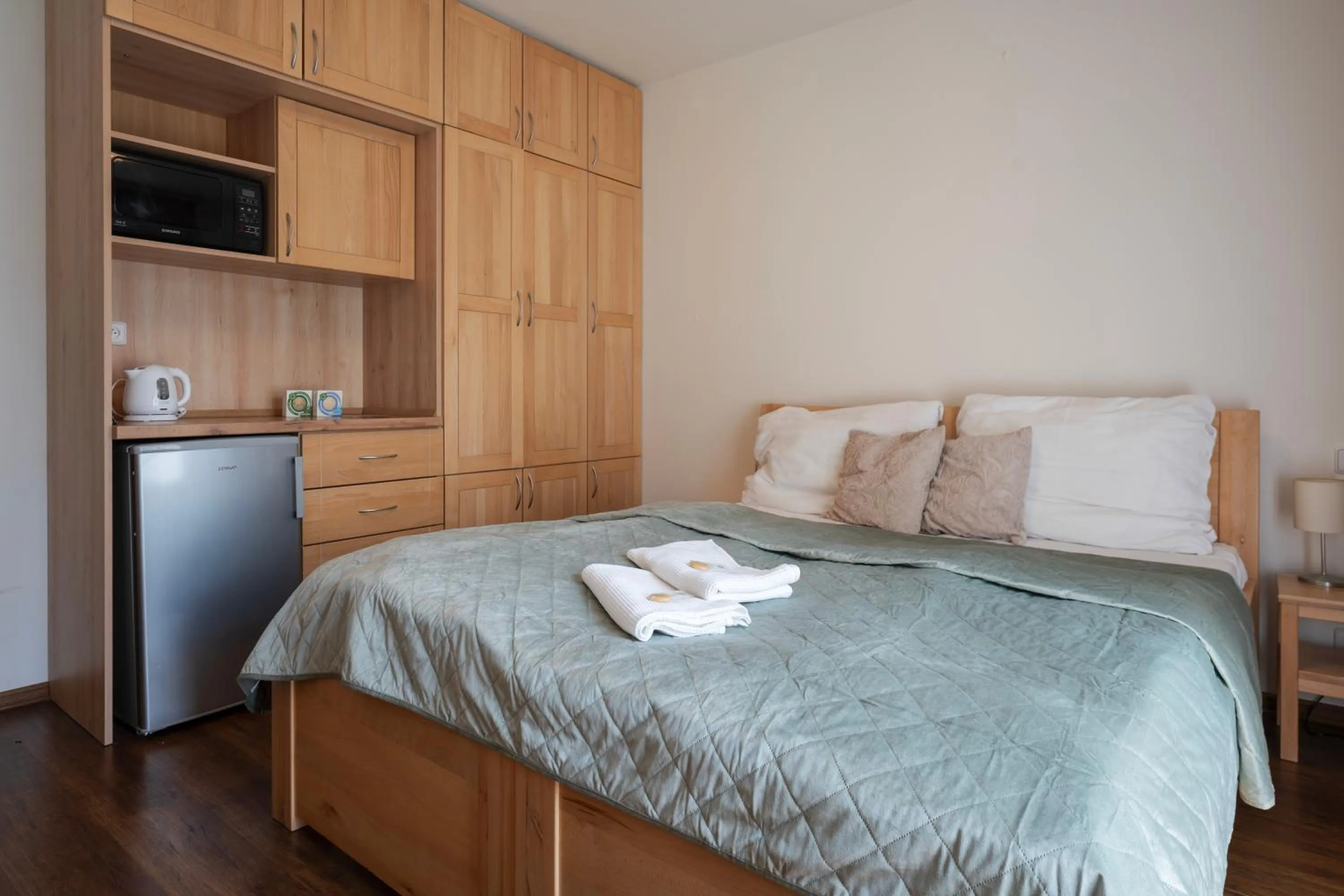 Kitchen or kitchenette, Bed in Rezidence & Wellness Blatov