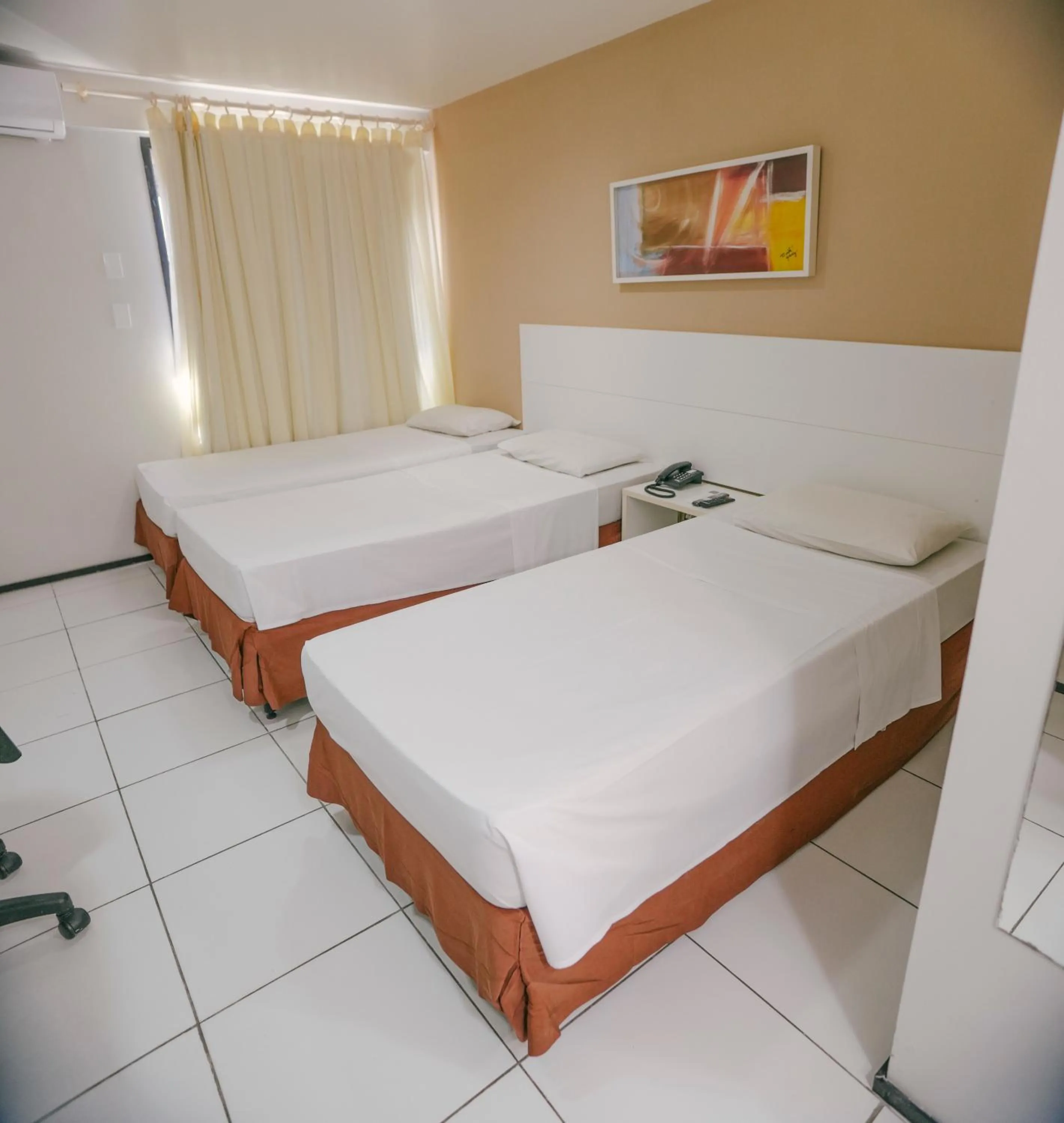 Bed in SLZ Lagoa Hotel