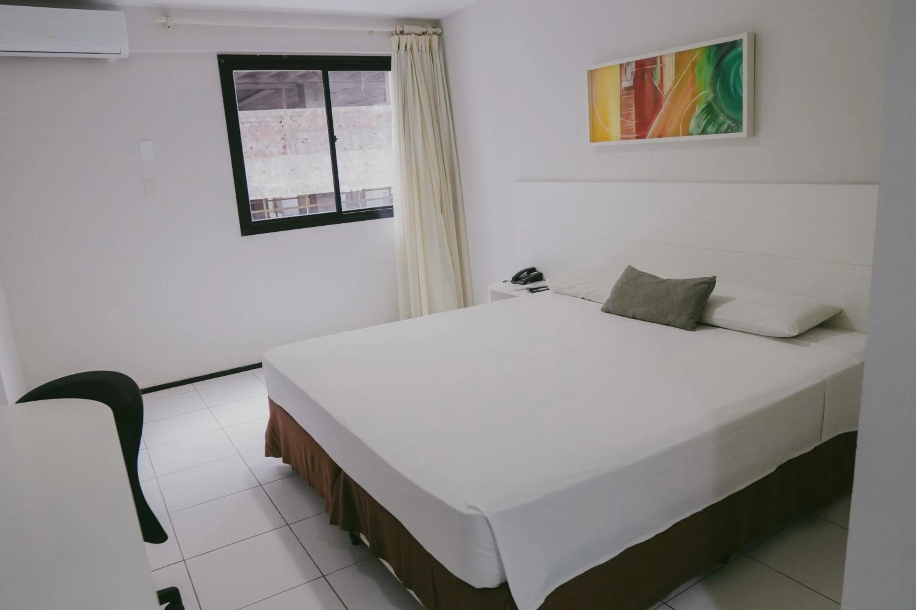 Bed in SLZ Lagoa Hotel