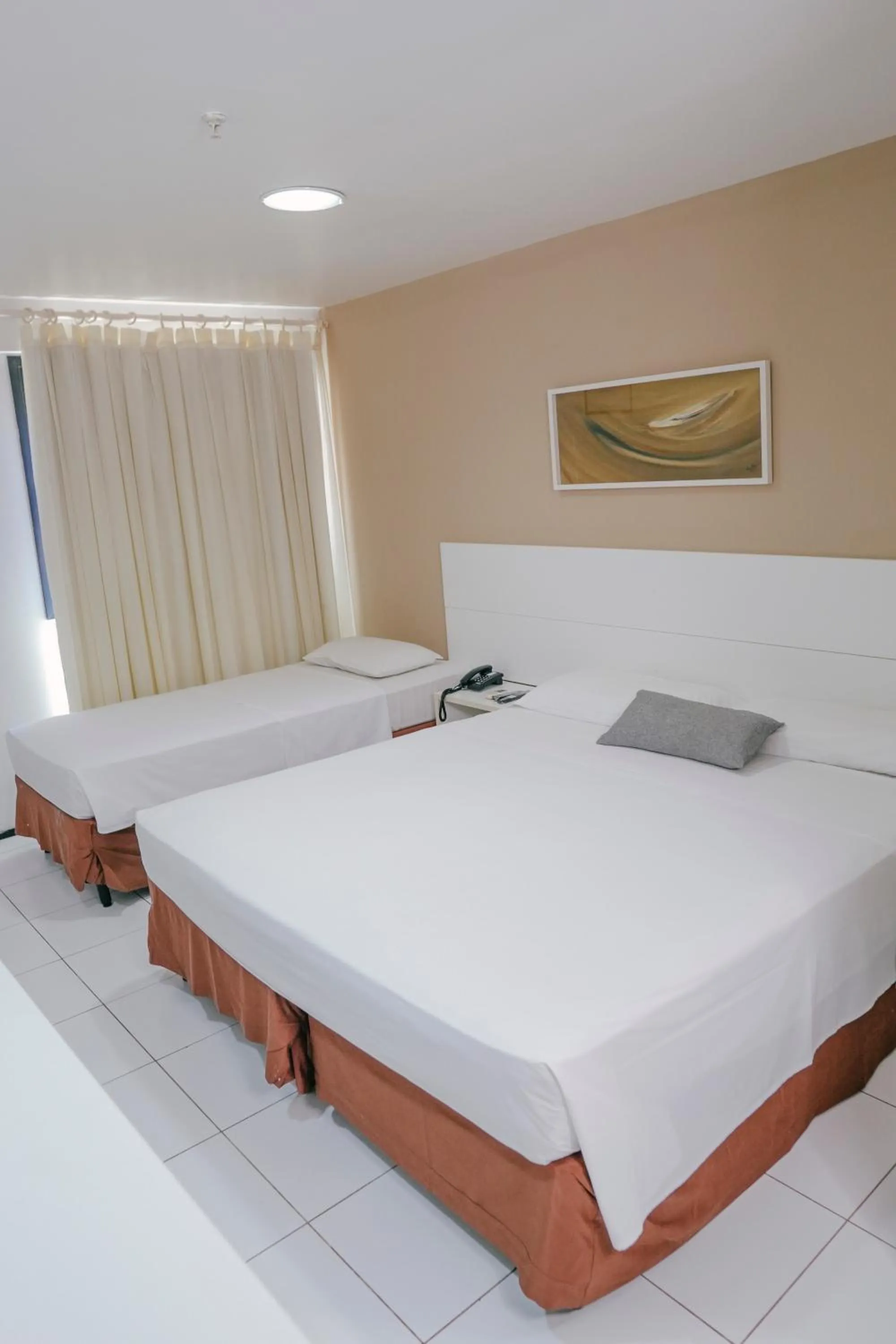 Bed in SLZ Lagoa Hotel