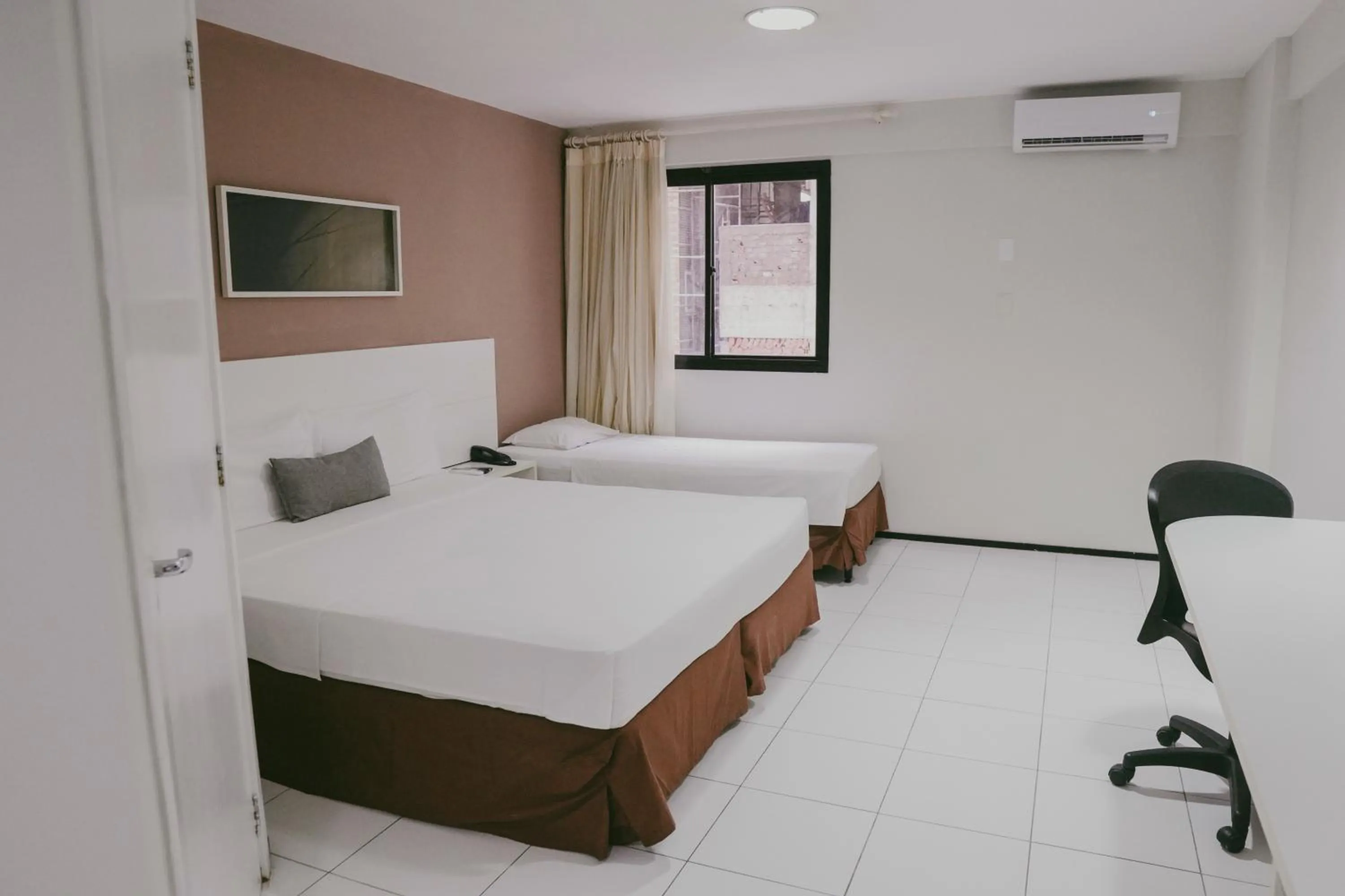 Bed in SLZ Lagoa Hotel