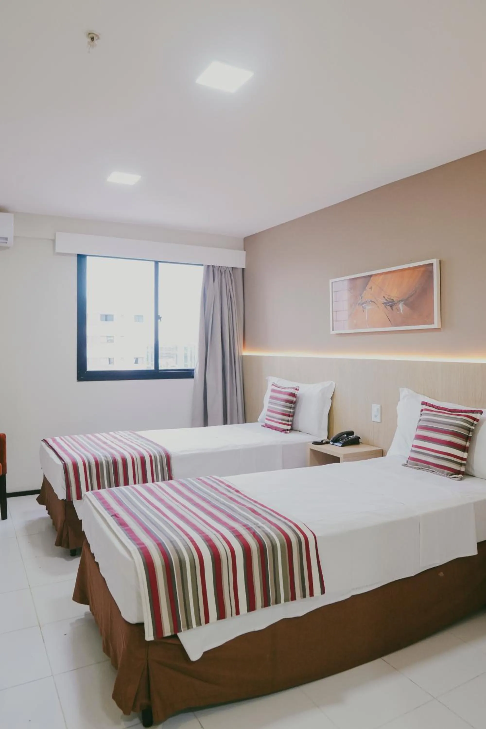 Bed in SLZ Lagoa Hotel