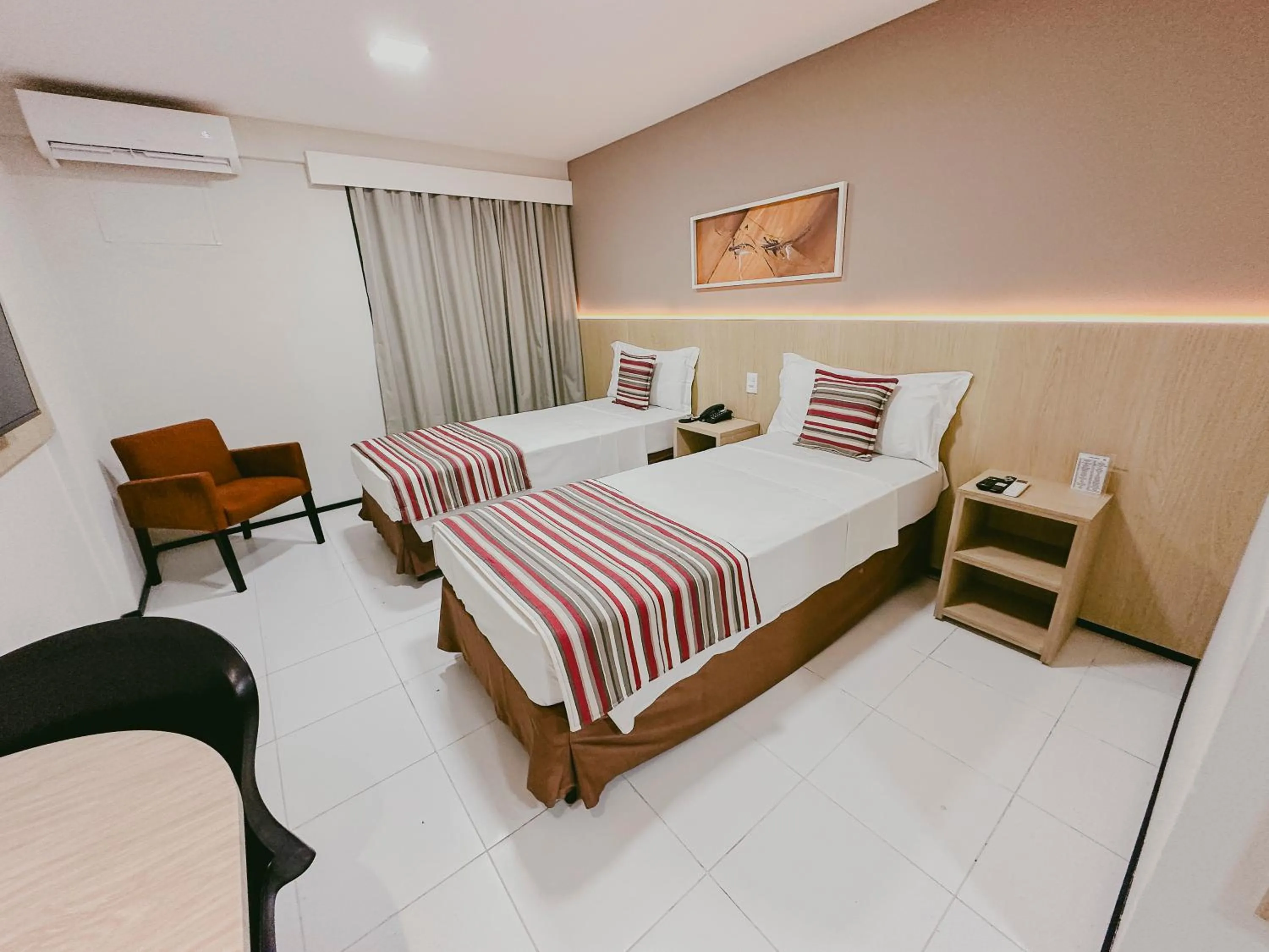 Bed in SLZ Lagoa Hotel