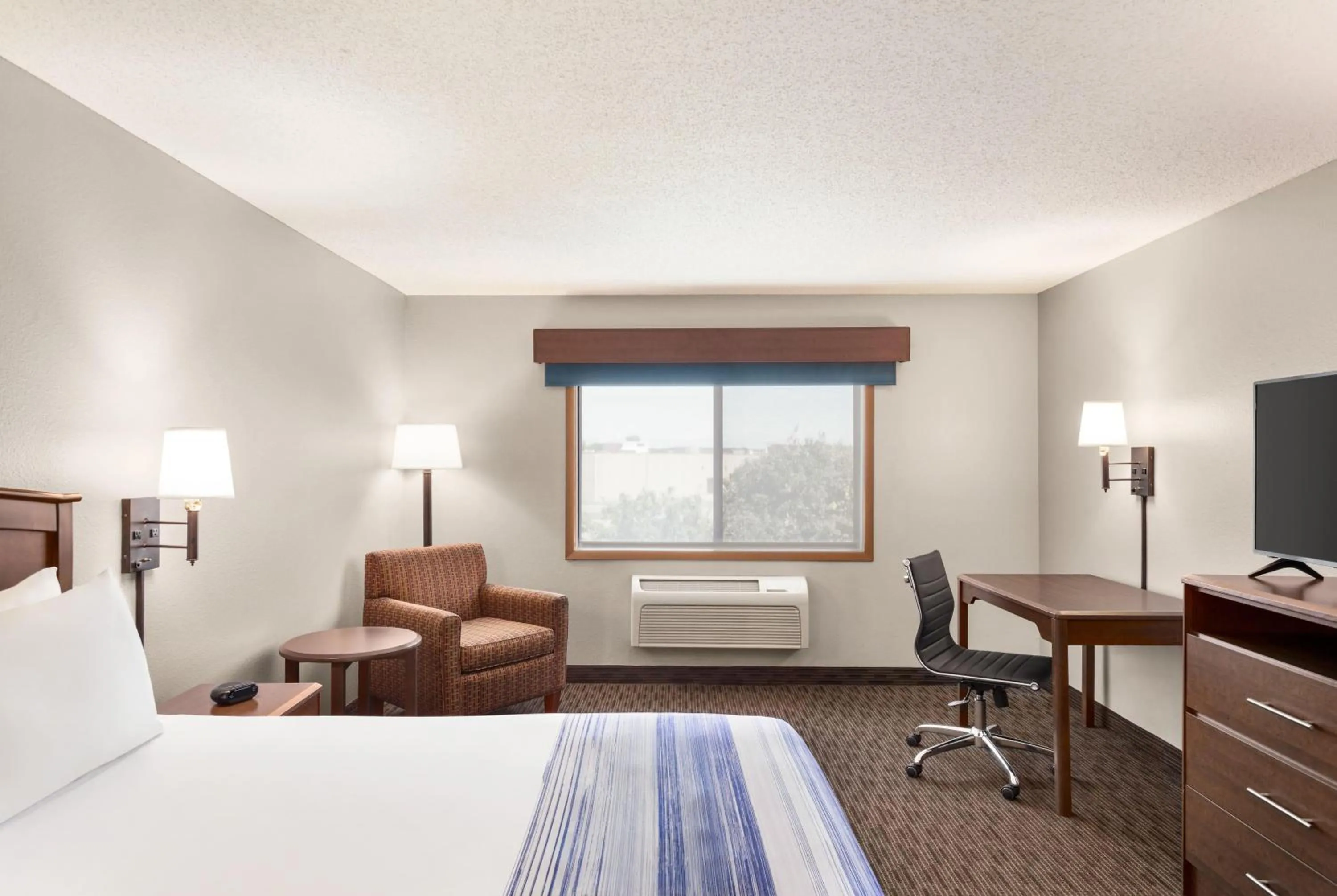 Photo of the whole room, Bed in AmericInn by Wyndham Fergus Falls Conference Center