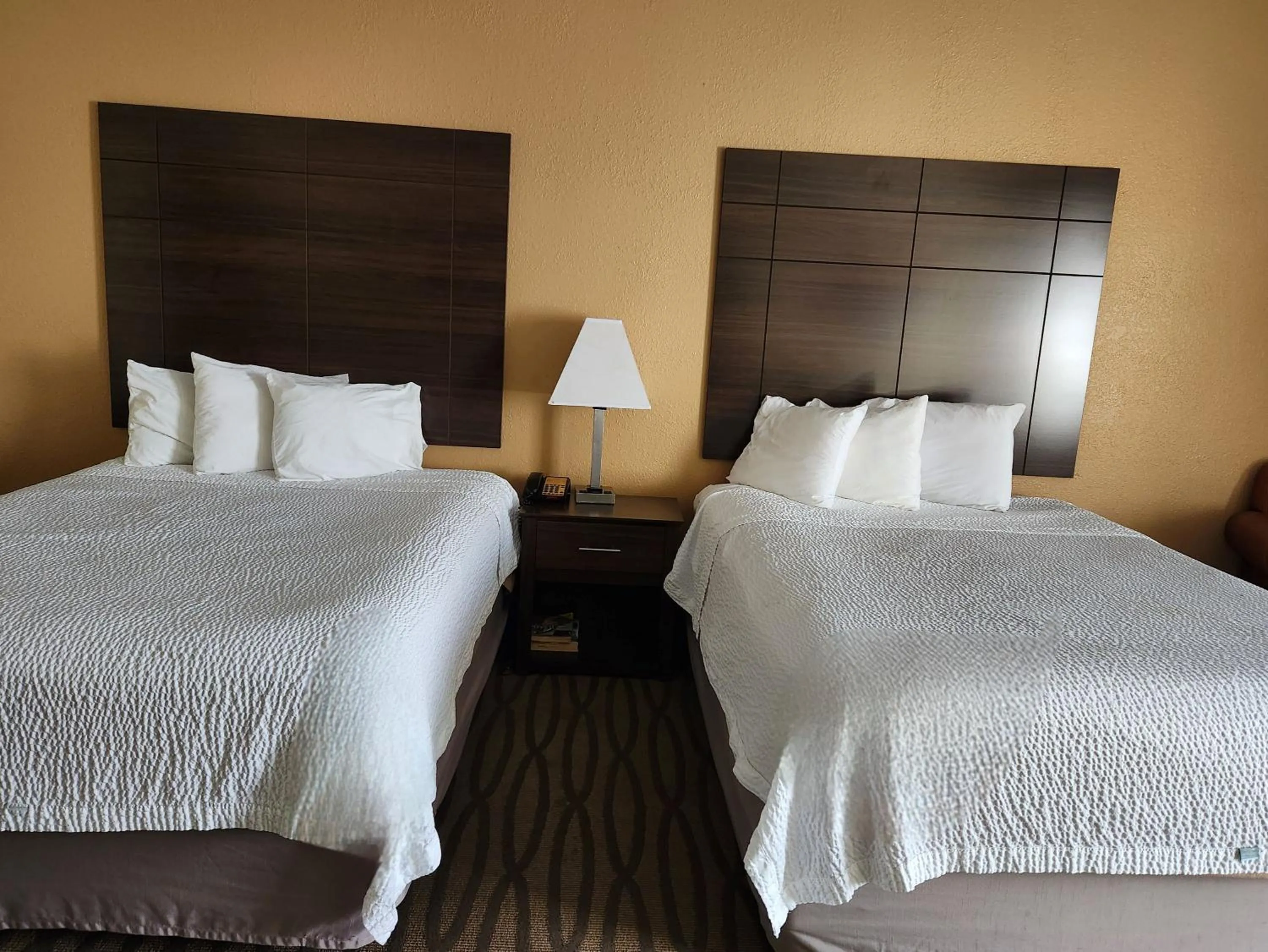 Bedroom, Bed in Studio 6 Suites Pasadena, TX