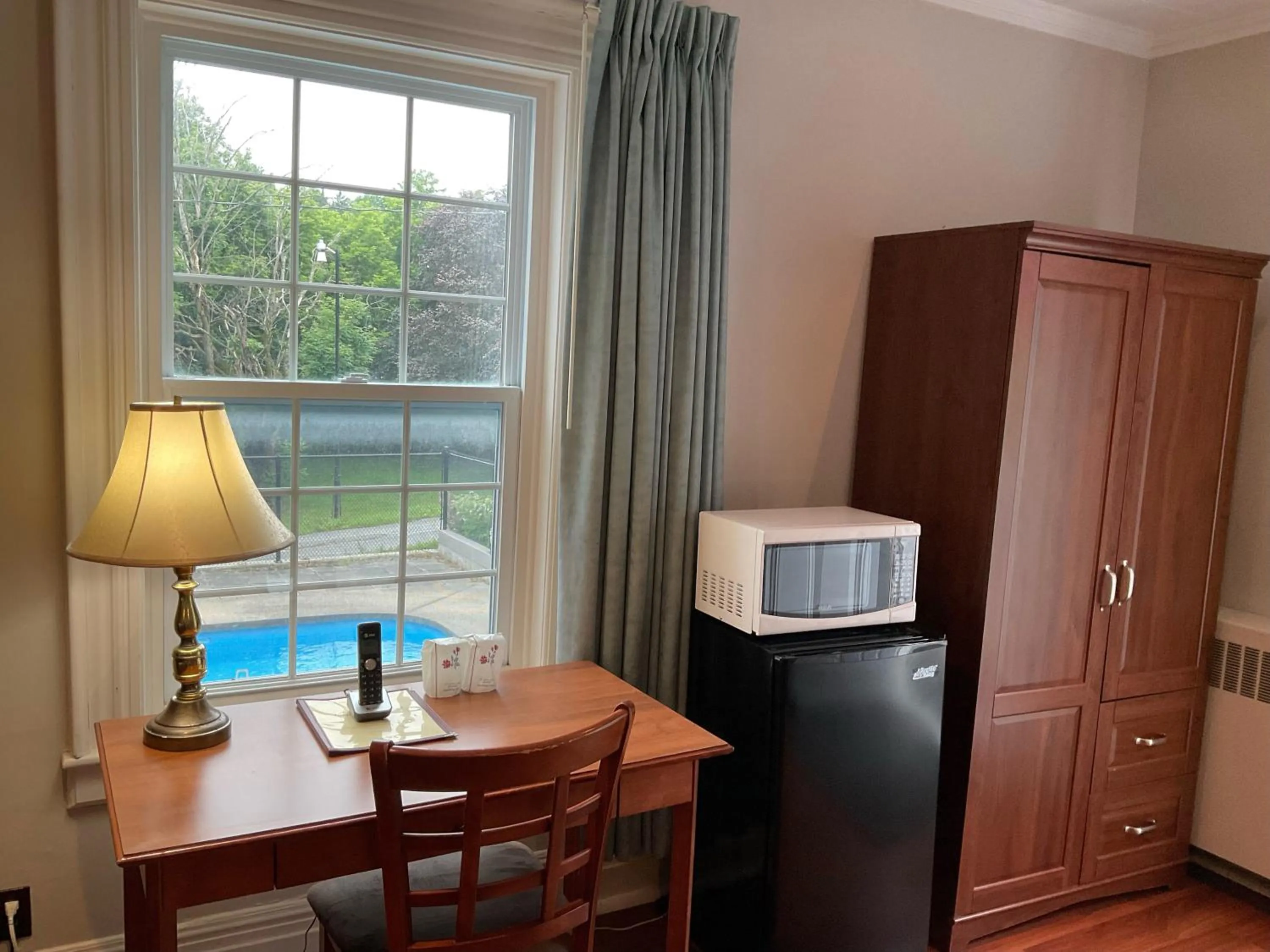 Pool view in Motel & Hotel La Paysanne