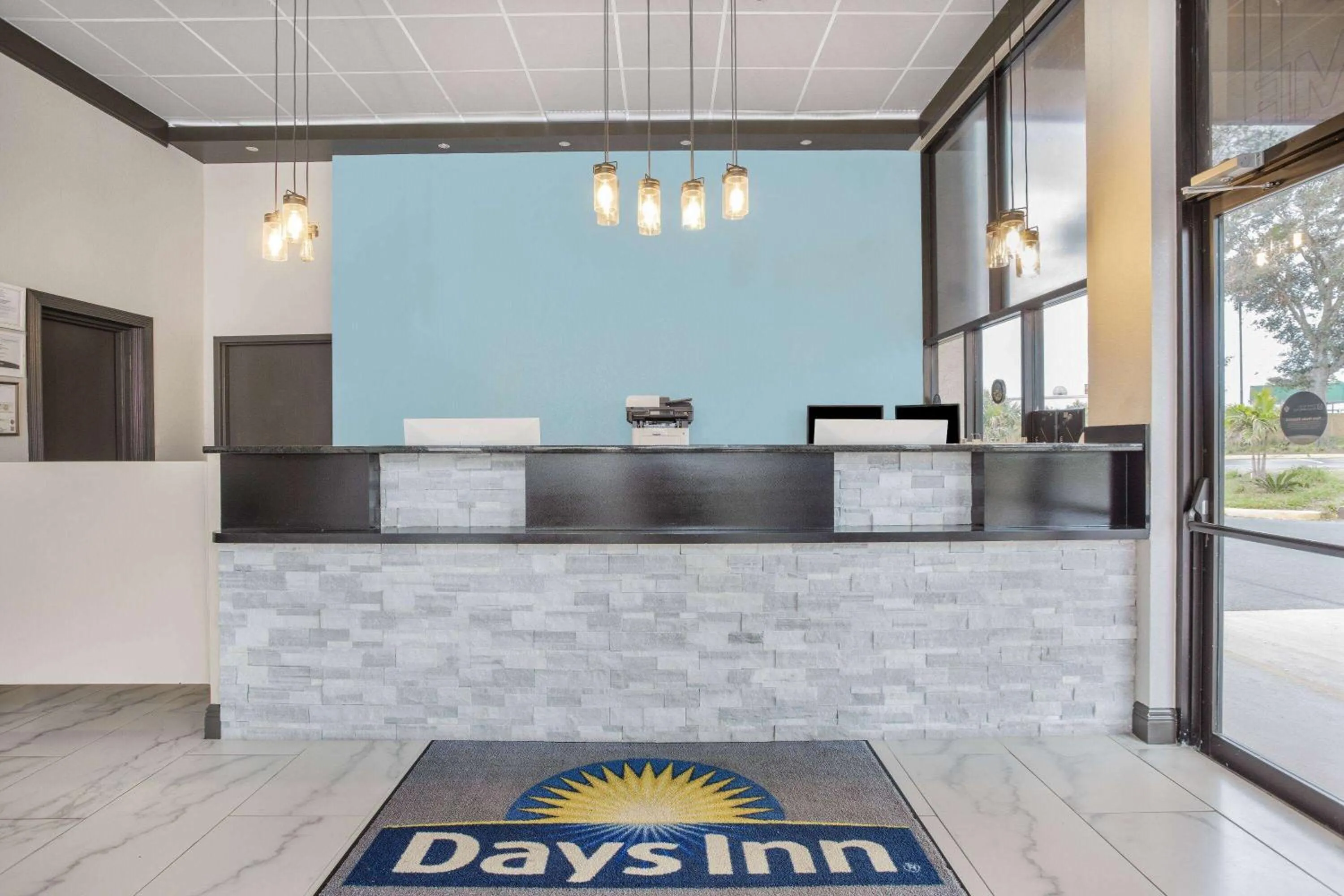 Lobby or reception in Days Inn by Wyndham N Orlando/Casselberry