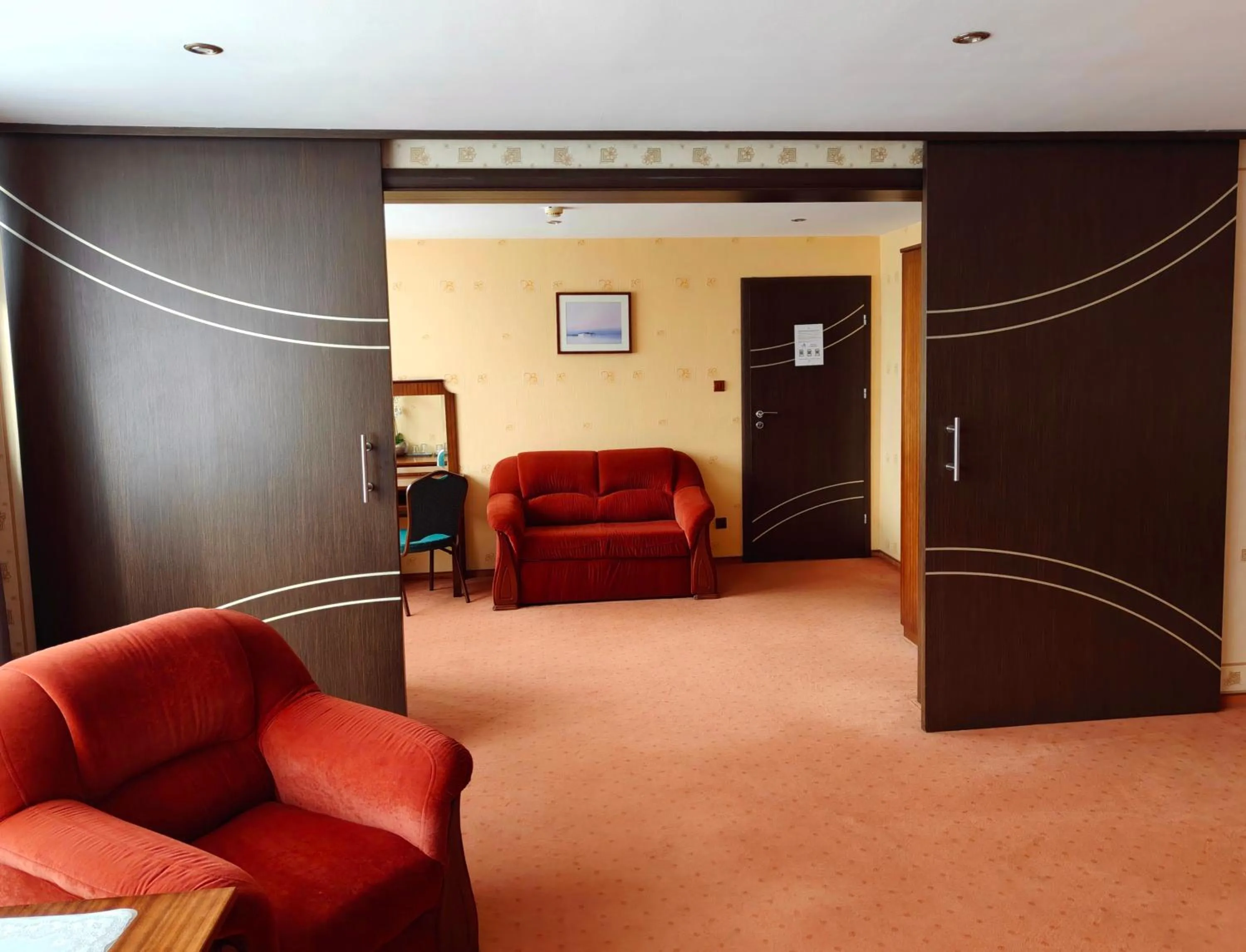 Communal lounge/ TV room in Hotel Alf