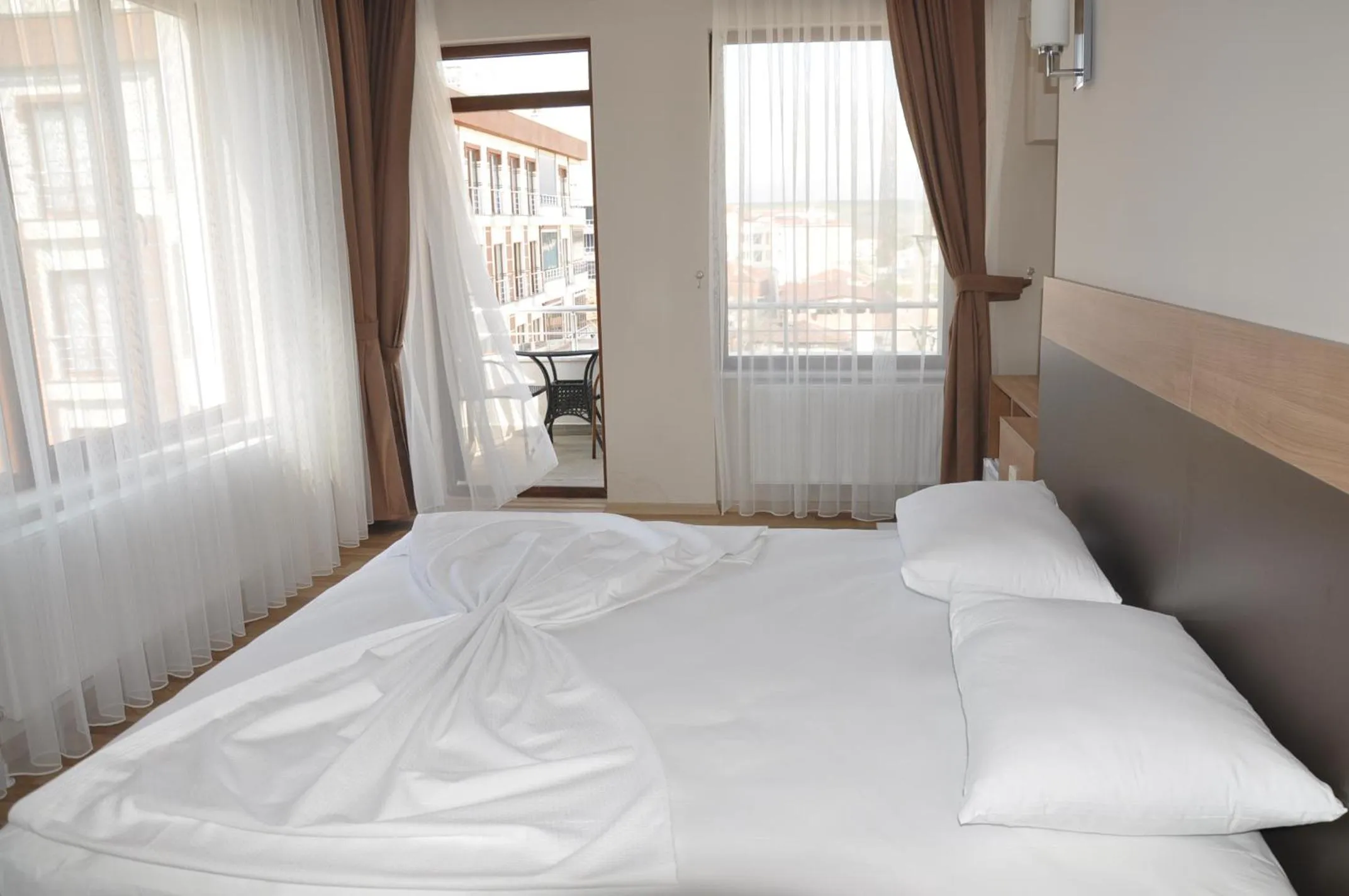 Bed in Longoz Hotel