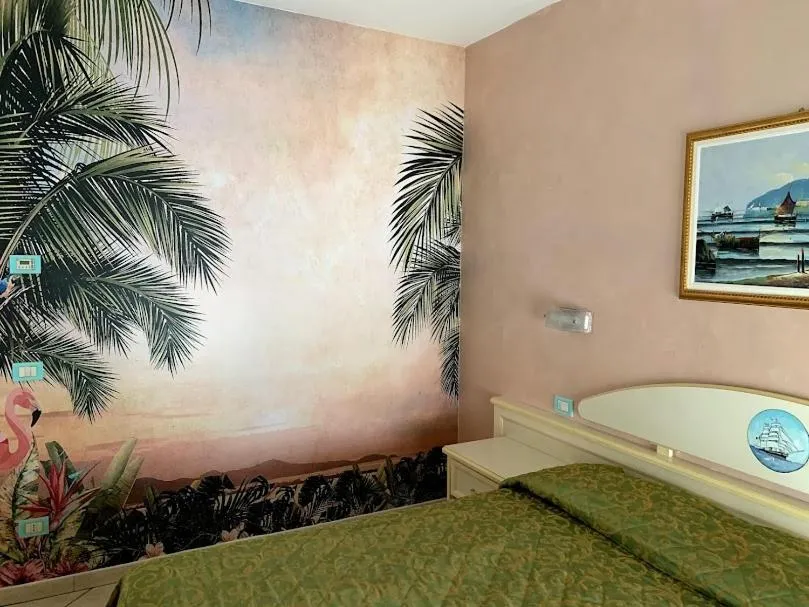 Bed in Hotel Residence Veliero