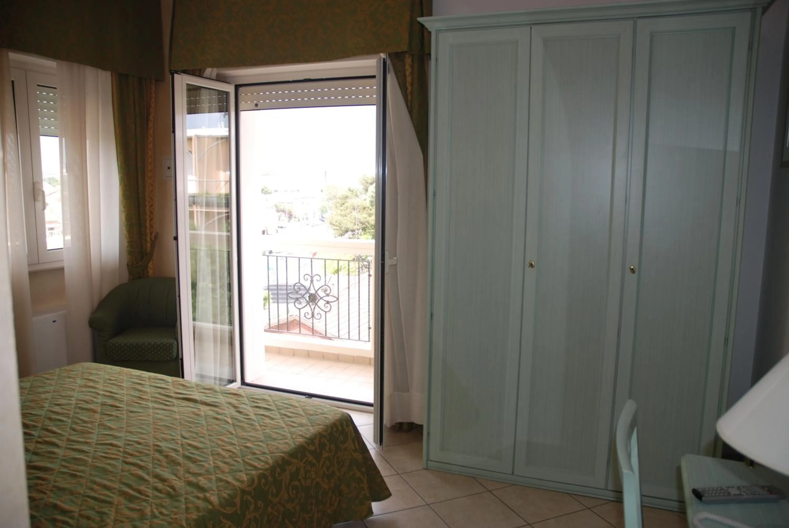 Bed in Hotel Residence Veliero