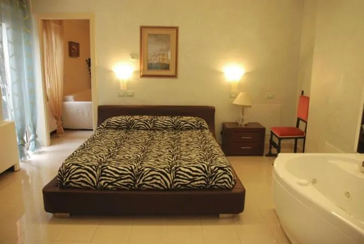 Bed in Hotel Residence Veliero