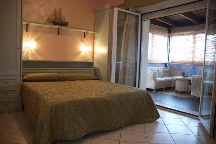 Bed in Hotel Residence Veliero