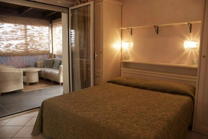 Bed in Hotel Residence Veliero