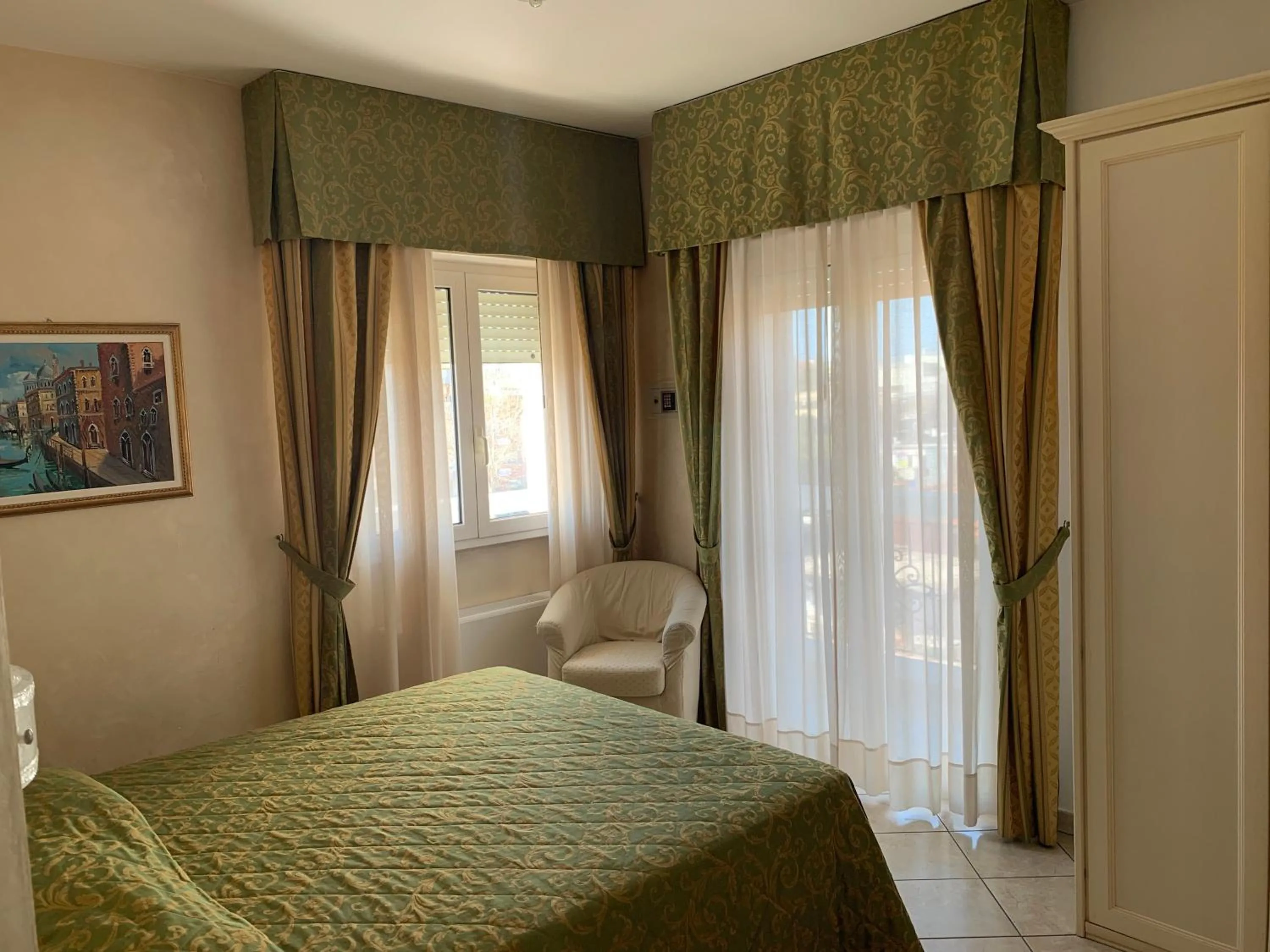 Bed in Hotel Residence Veliero