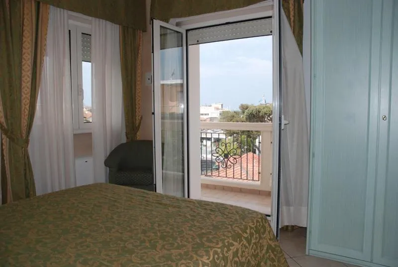 Bed in Hotel Residence Veliero