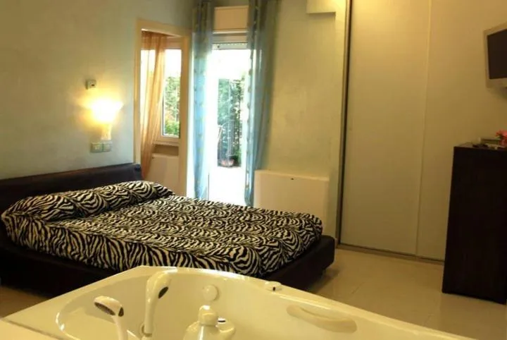 Bed in Hotel Residence Veliero