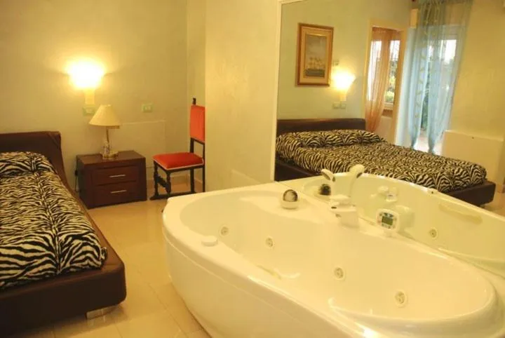 Bed in Hotel Residence Veliero