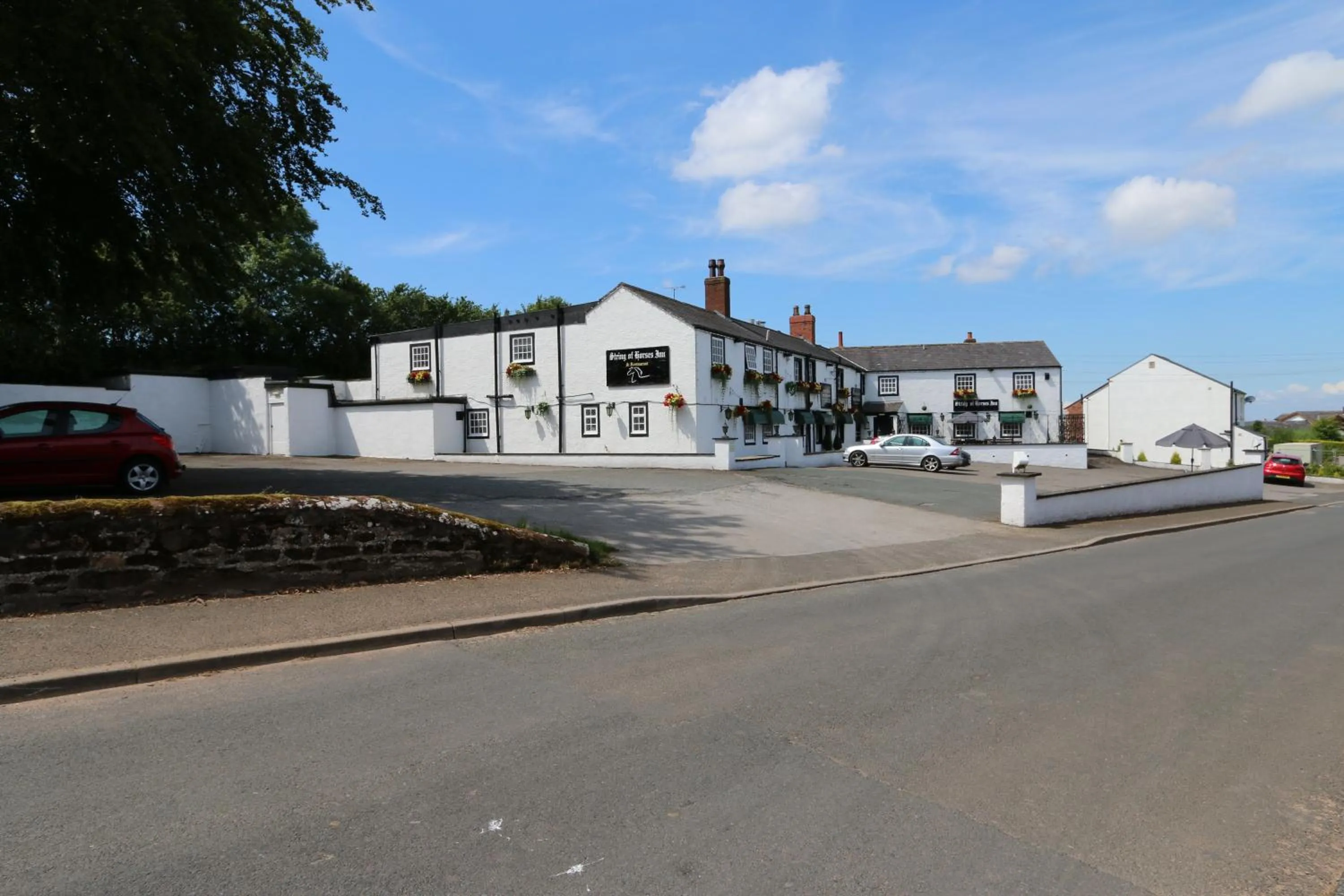 Property building in String Of Horses