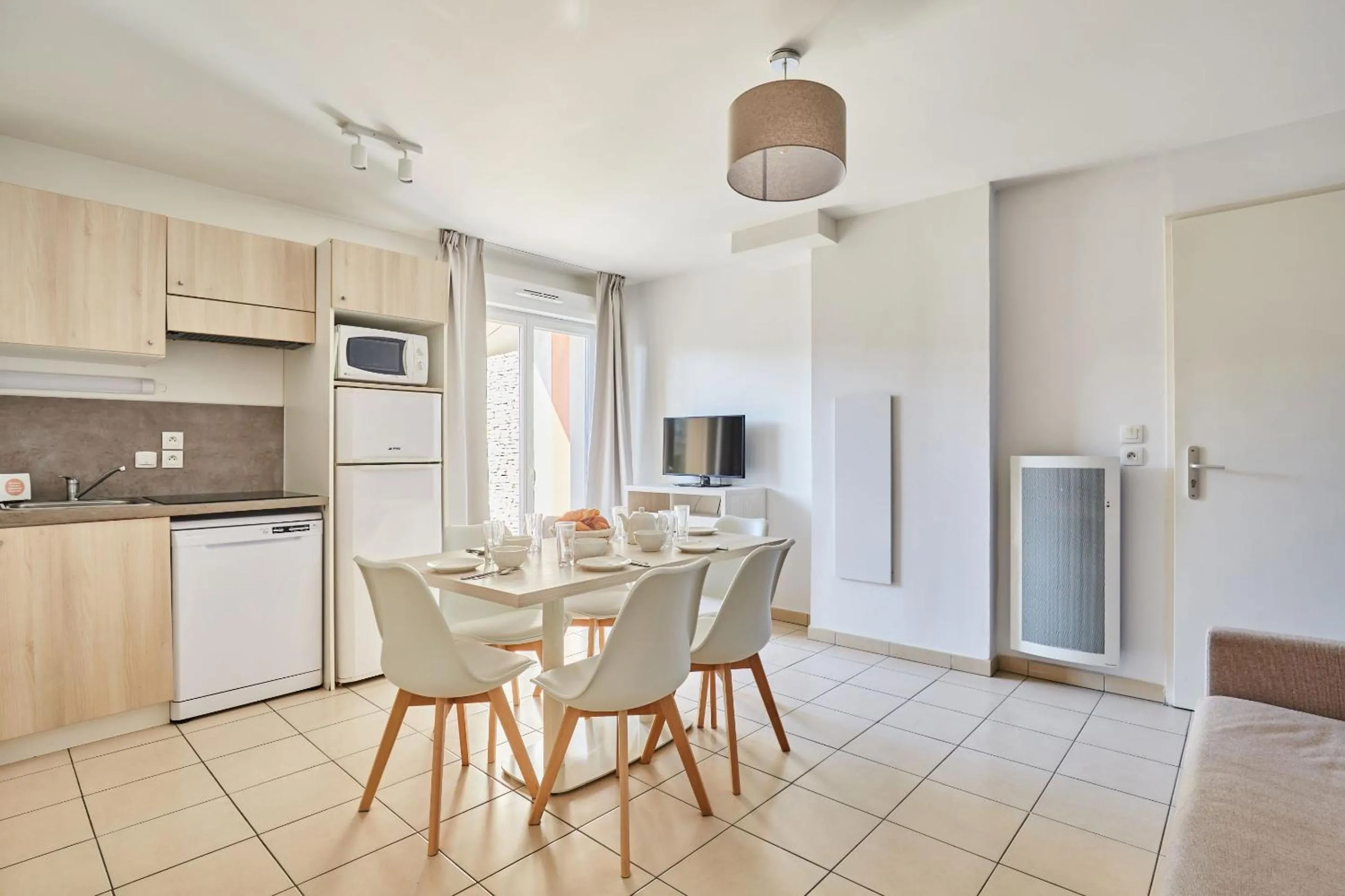 Dining area in Résidence Odalys Le Mas des Flamants