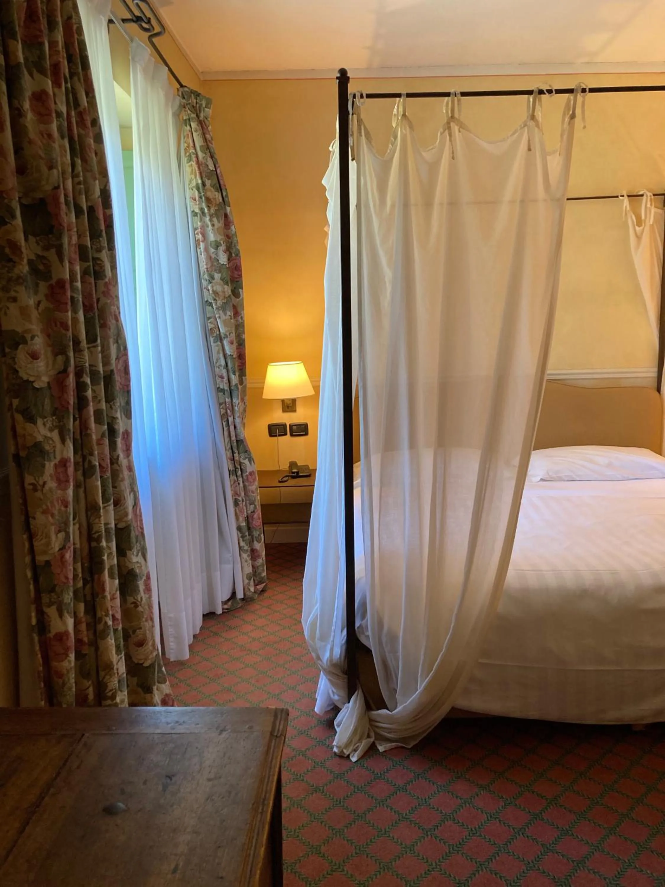 Bed in Locanda Maison Verte
