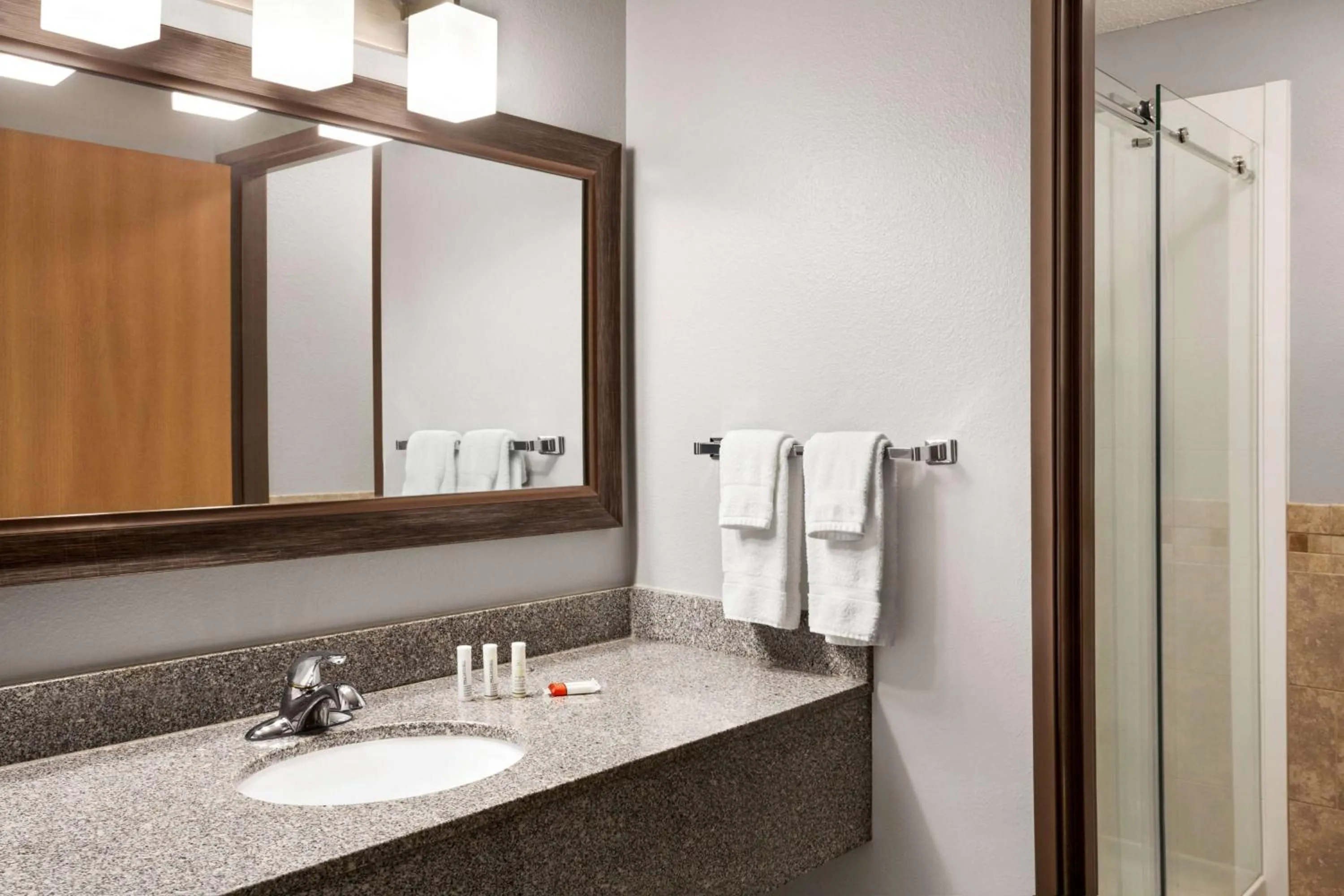 TV and multimedia in AmericInn by Wyndham Sauk Centre