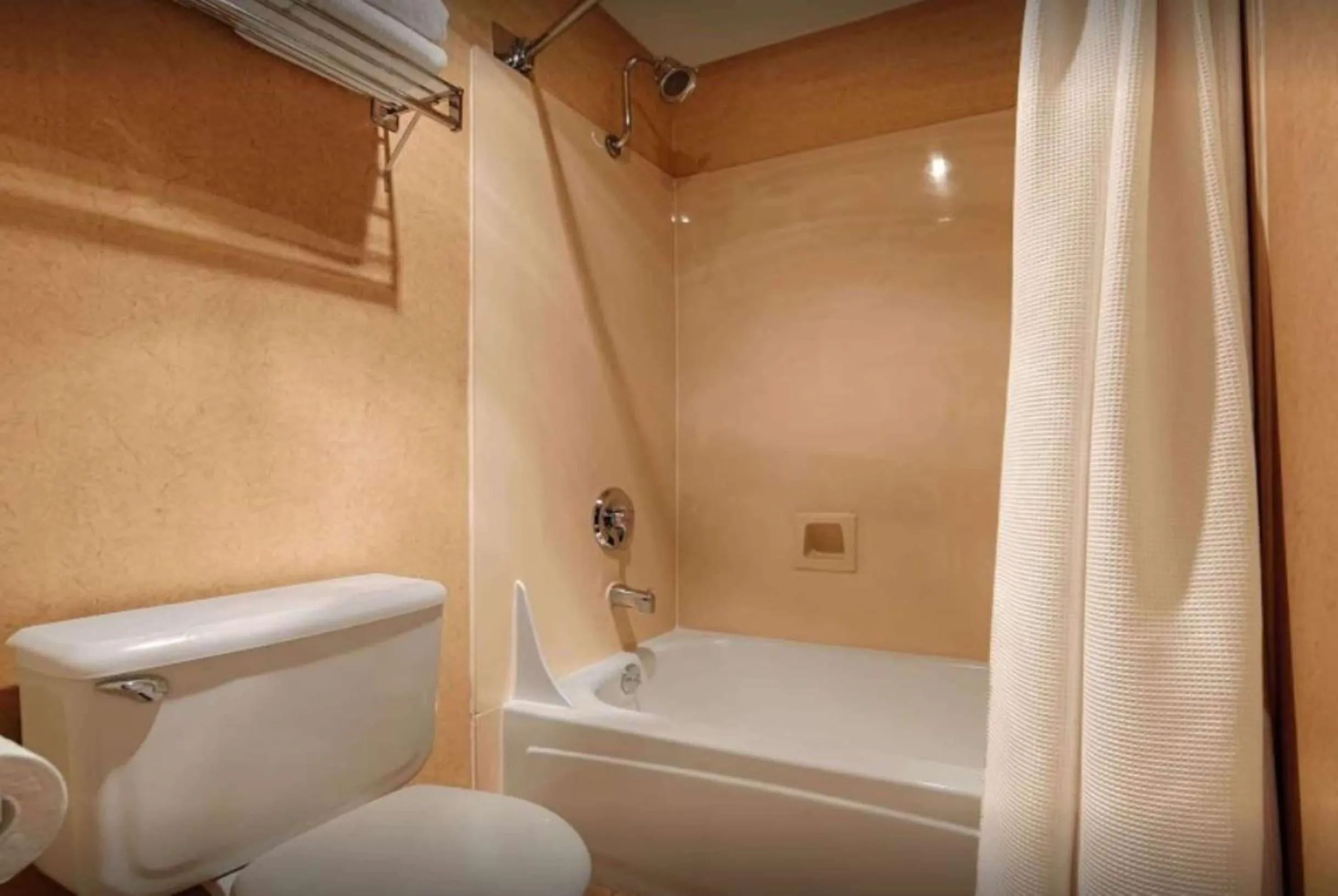 TV and multimedia in Pacifica Lighthouse Hotel Trademark Collection by Wyndham