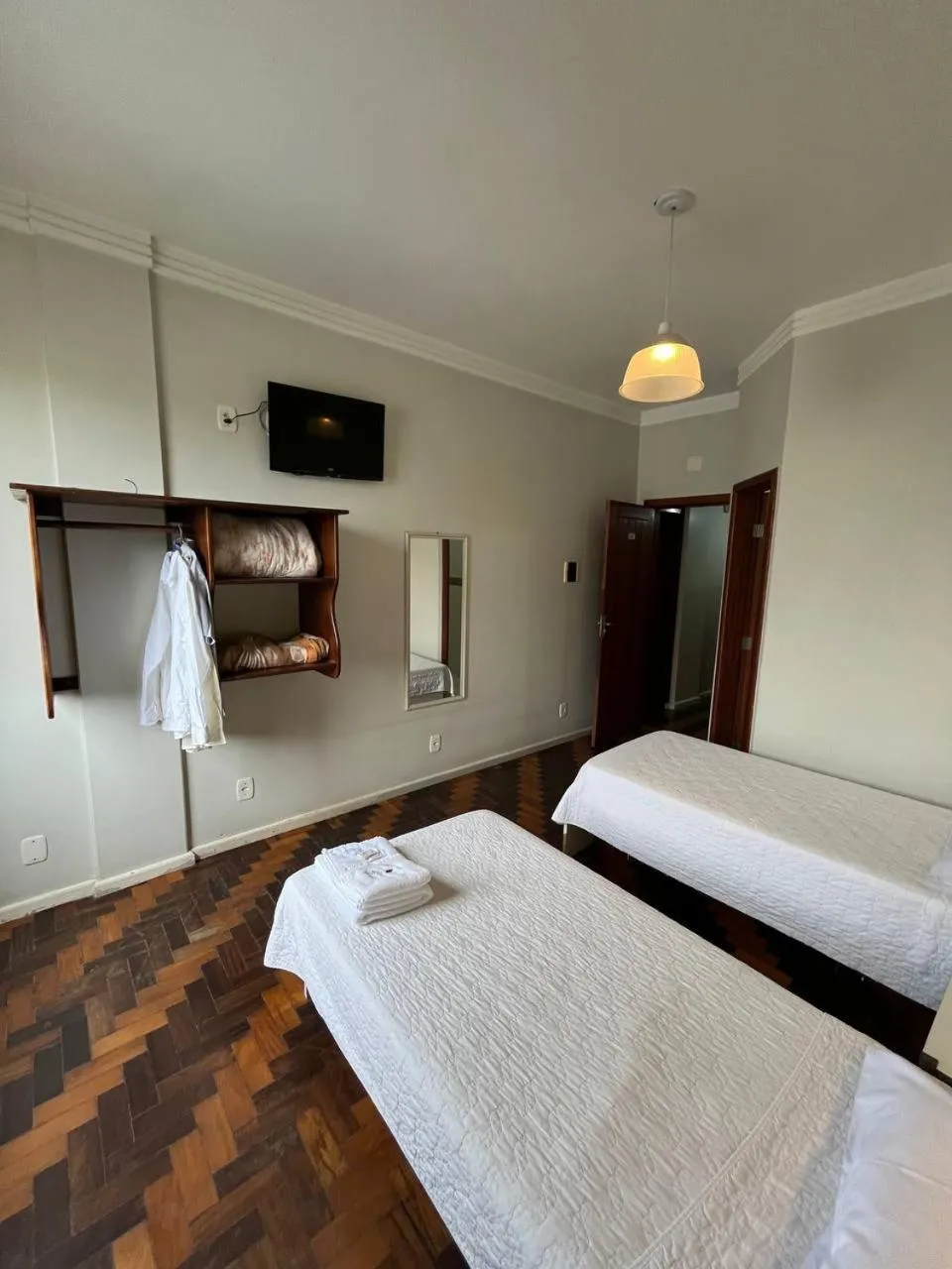 Photo of the whole room, Bed in Oscar Palace Hotel - Centro de Tubarão