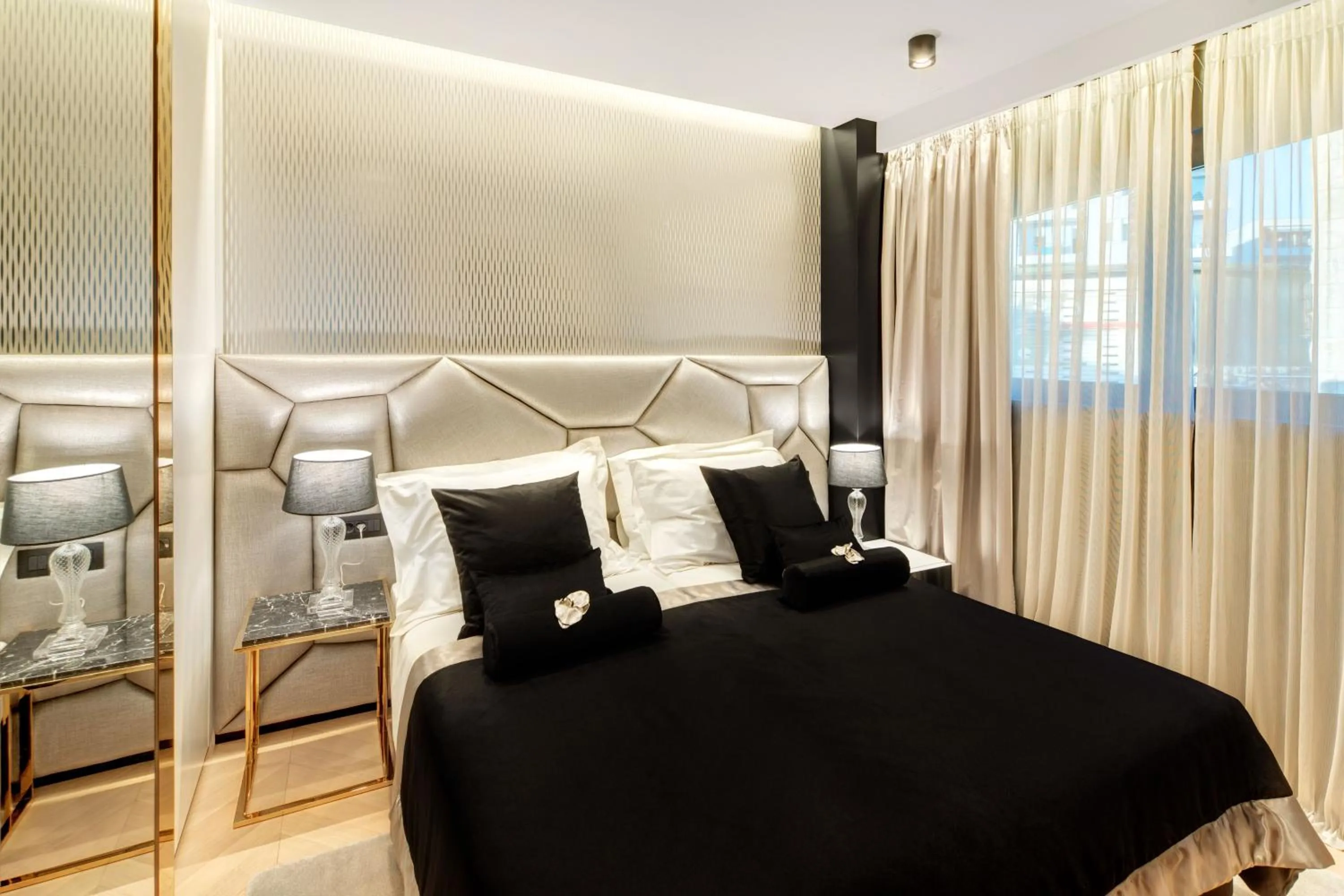 Bed in Posh Residence Luxury Suites