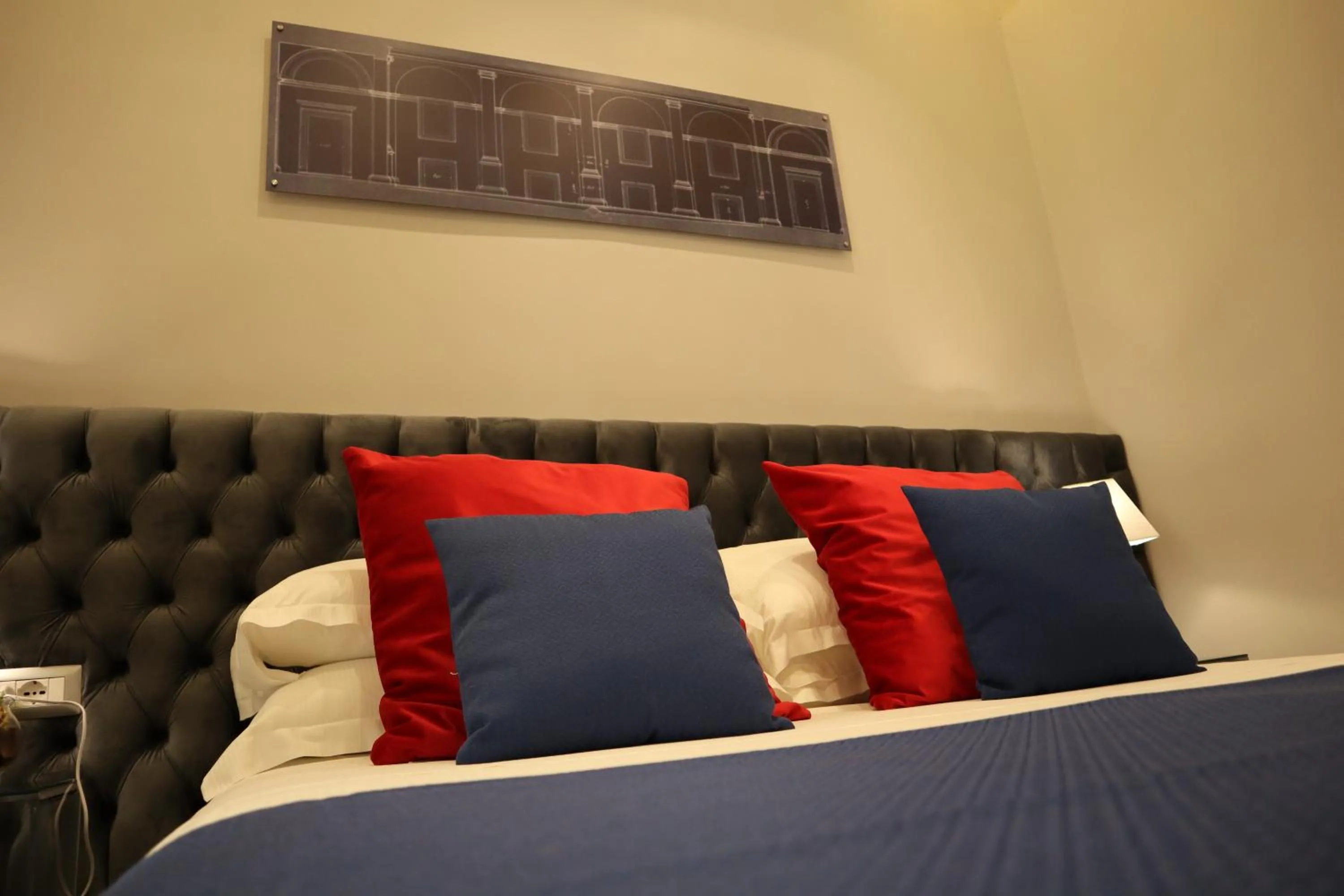 Bed in MILLINA SUITES IN NAVONA