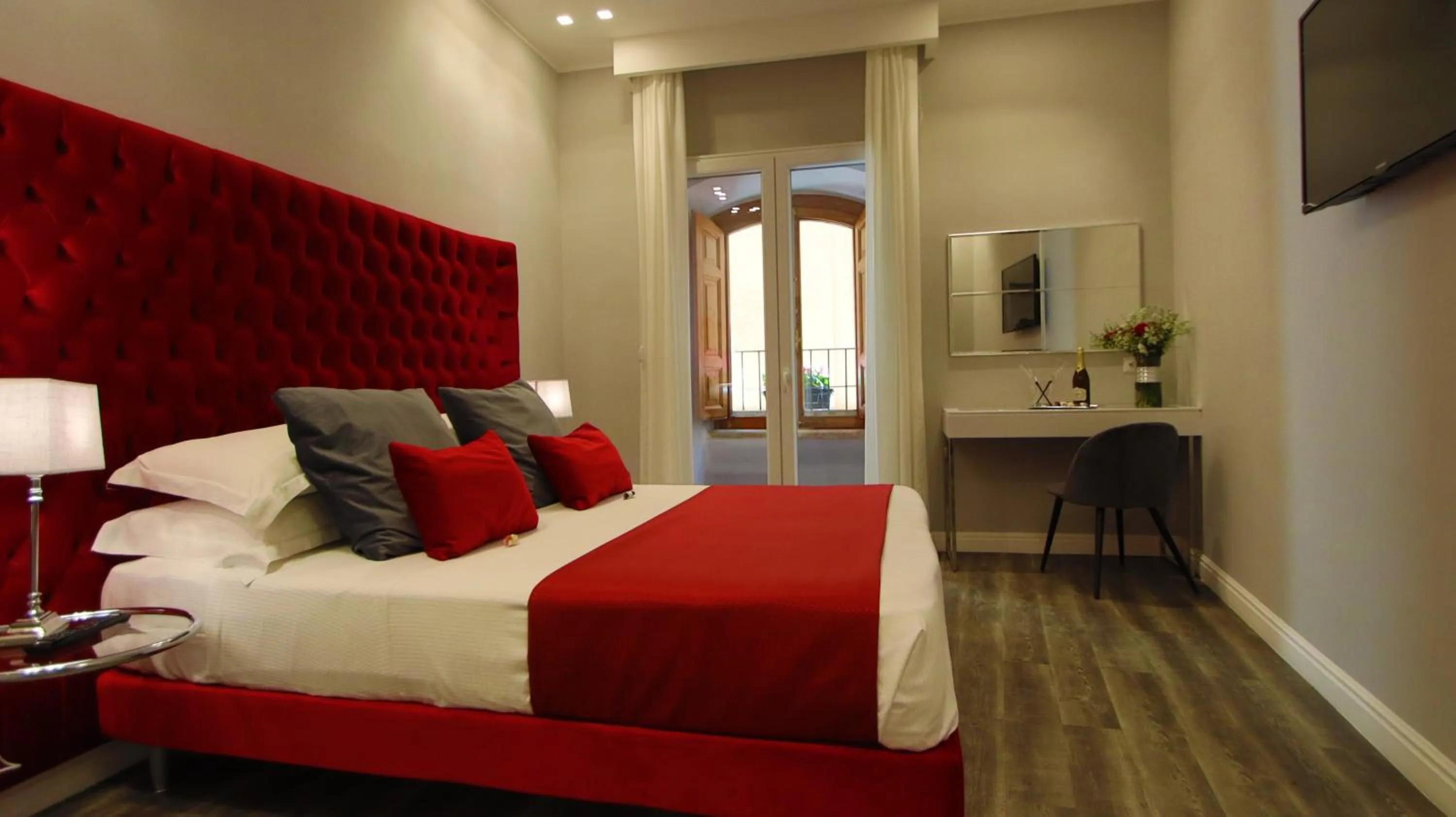 Photo of the whole room, Bed in MILLINA SUITES IN NAVONA