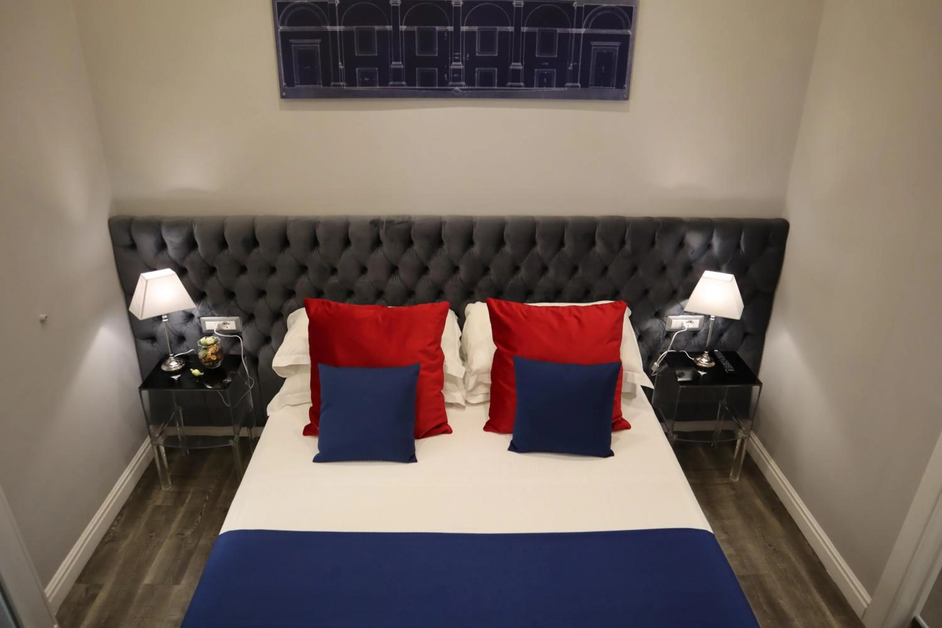 Photo of the whole room, Bed in MILLINA SUITES IN NAVONA