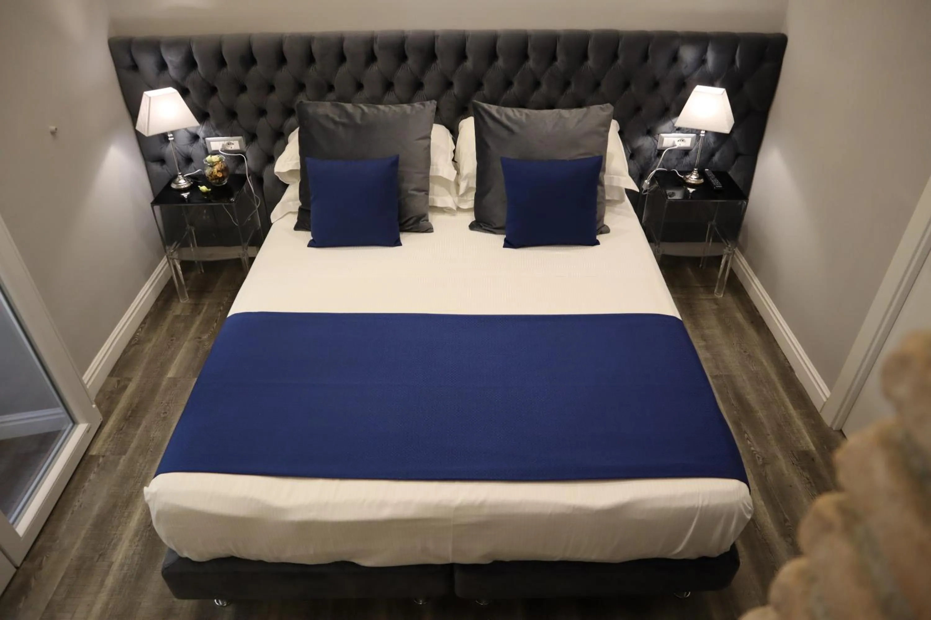 Photo of the whole room, Bed in MILLINA SUITES IN NAVONA