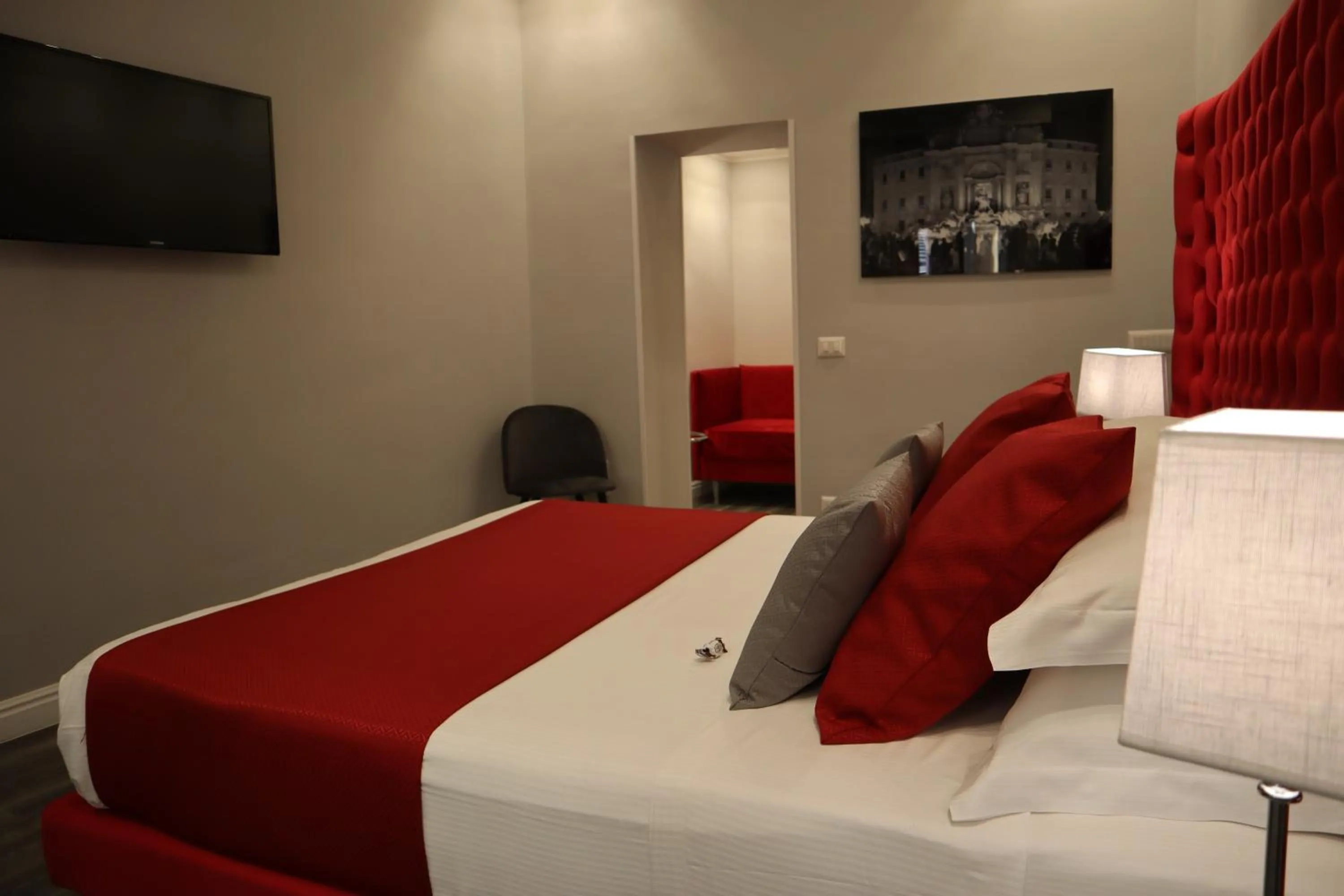 Photo of the whole room, Bed in MILLINA SUITES IN NAVONA