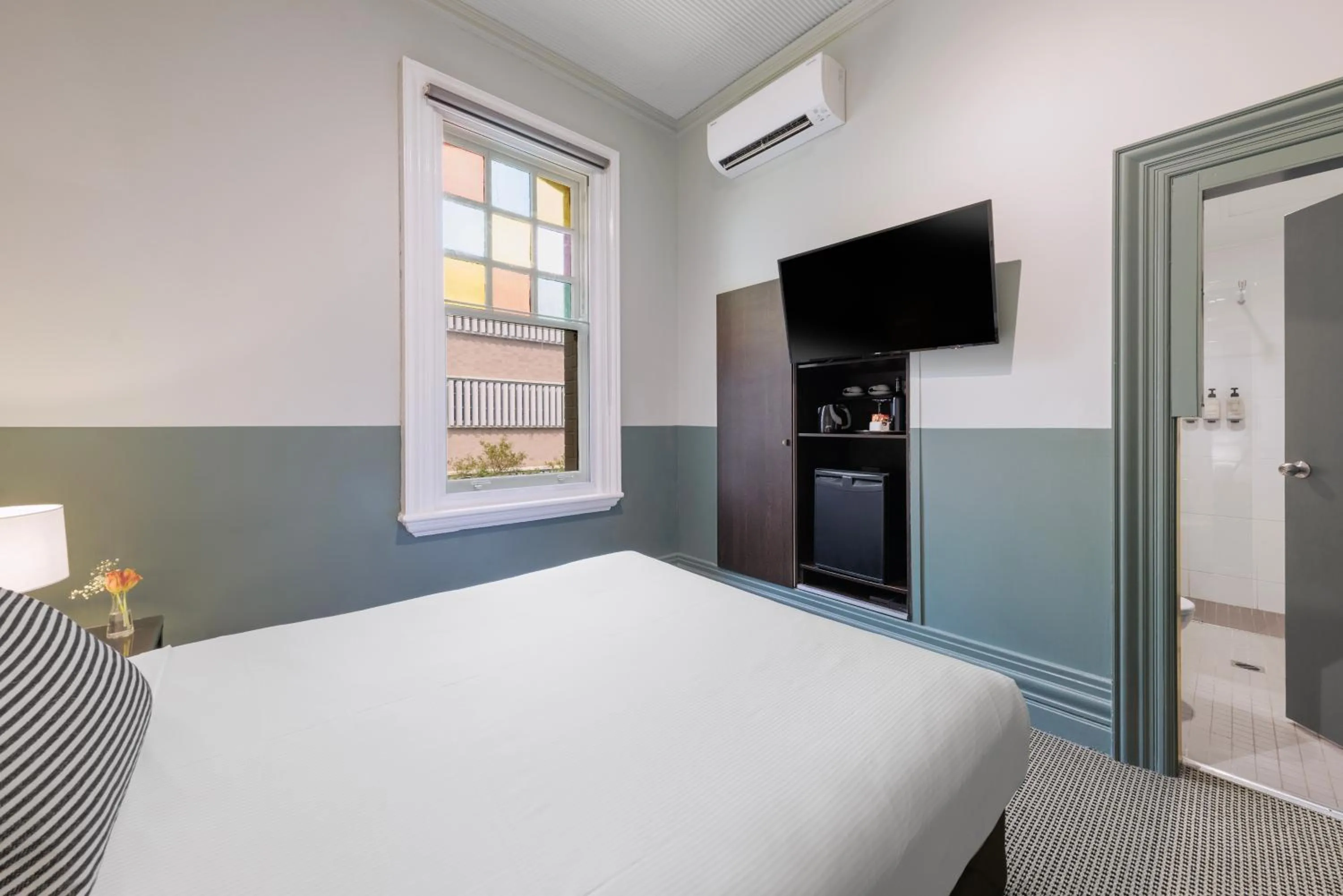 Bed in Vulcan Hotel Sydney