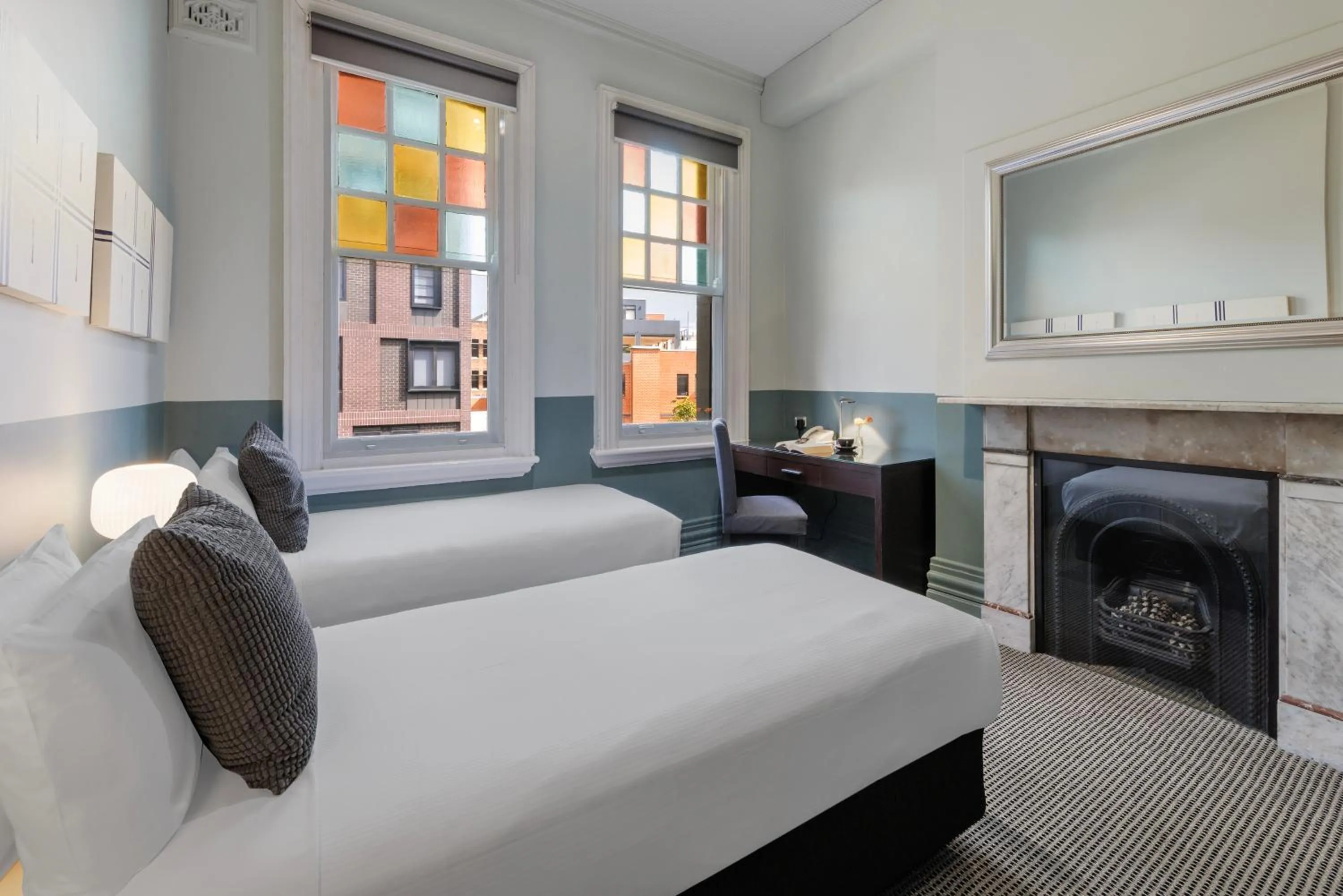 Bed in Vulcan Hotel Sydney