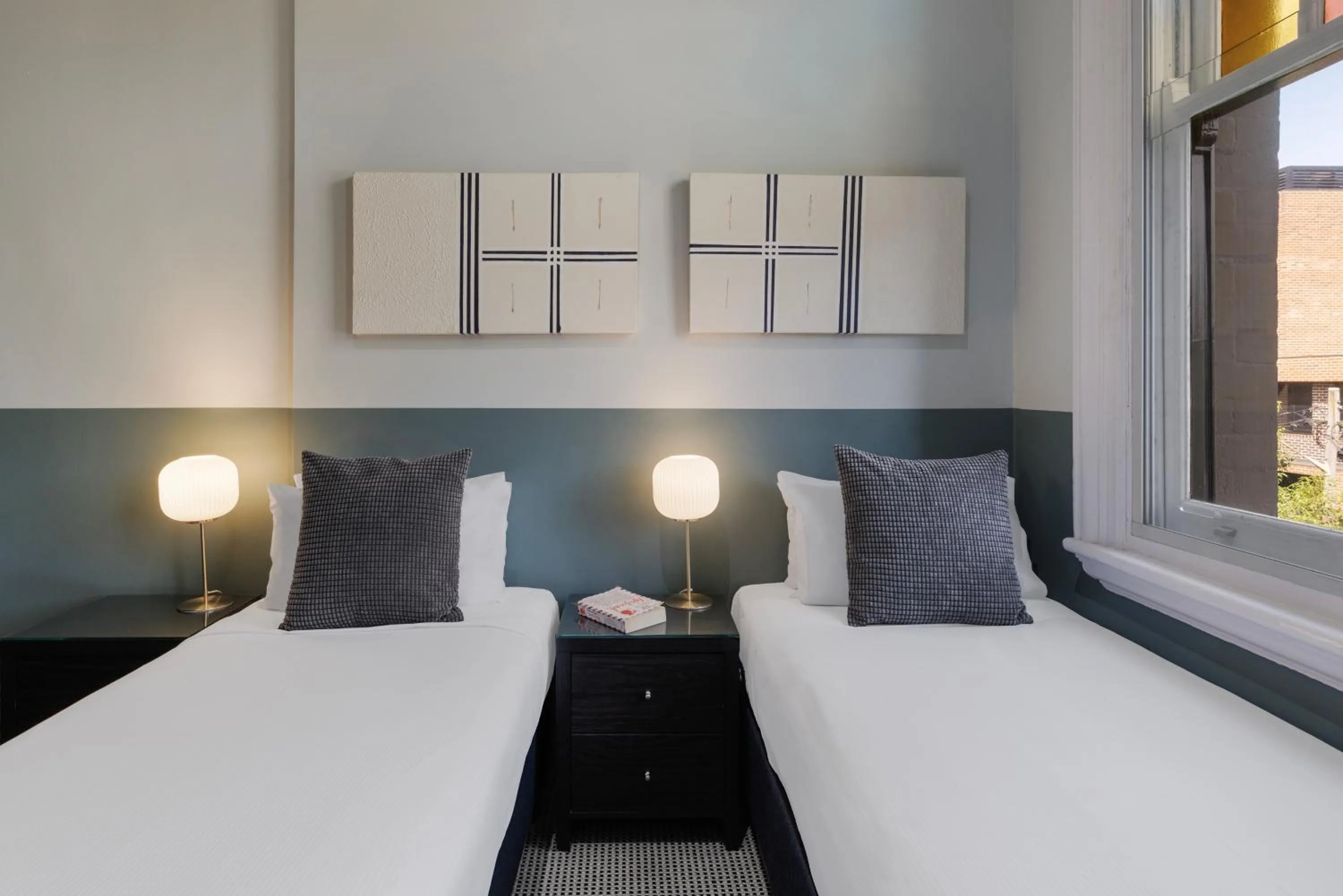 Bed in Vulcan Hotel Sydney