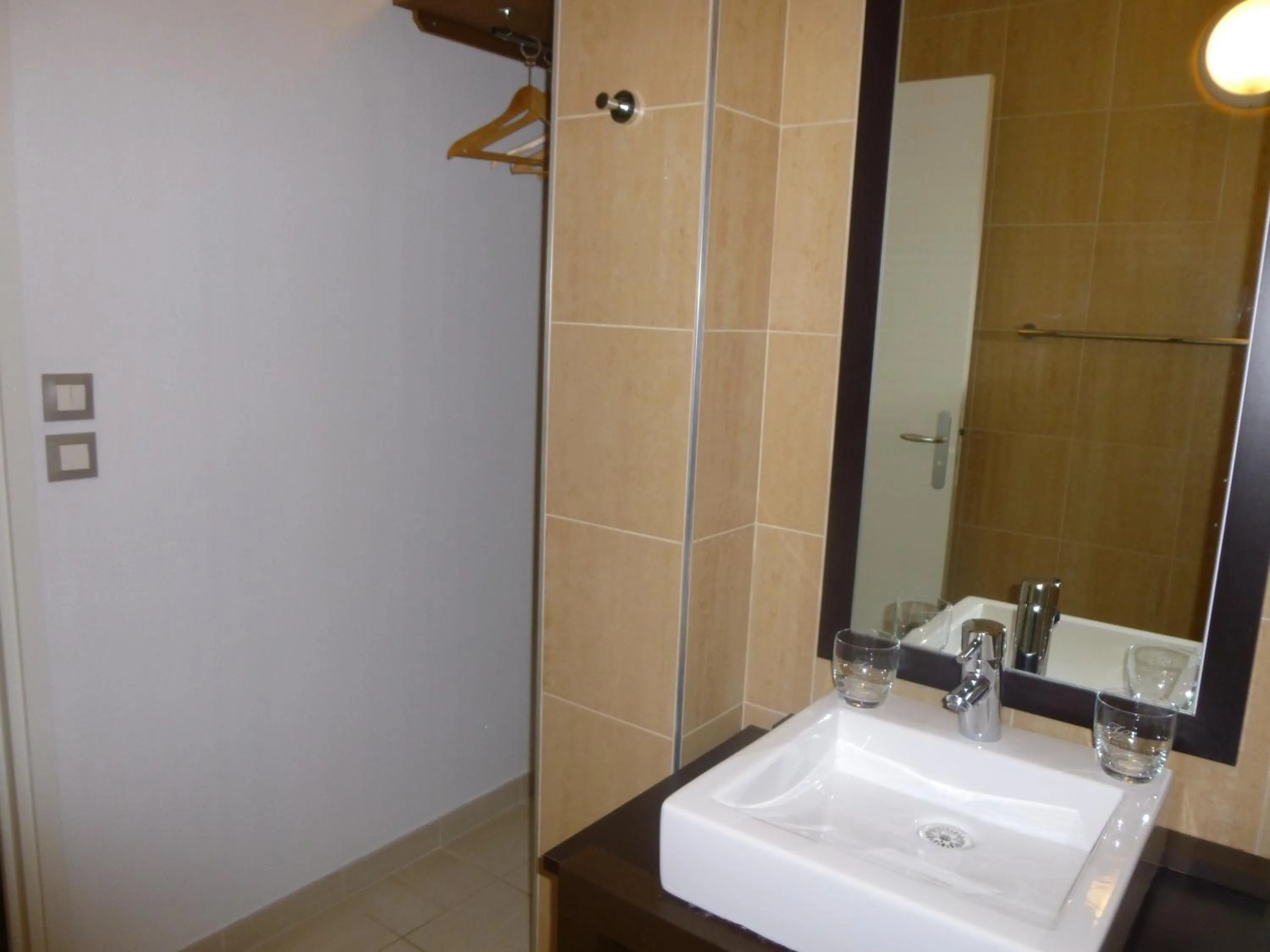 Bathroom in Logis Hôtel Terre de Loire