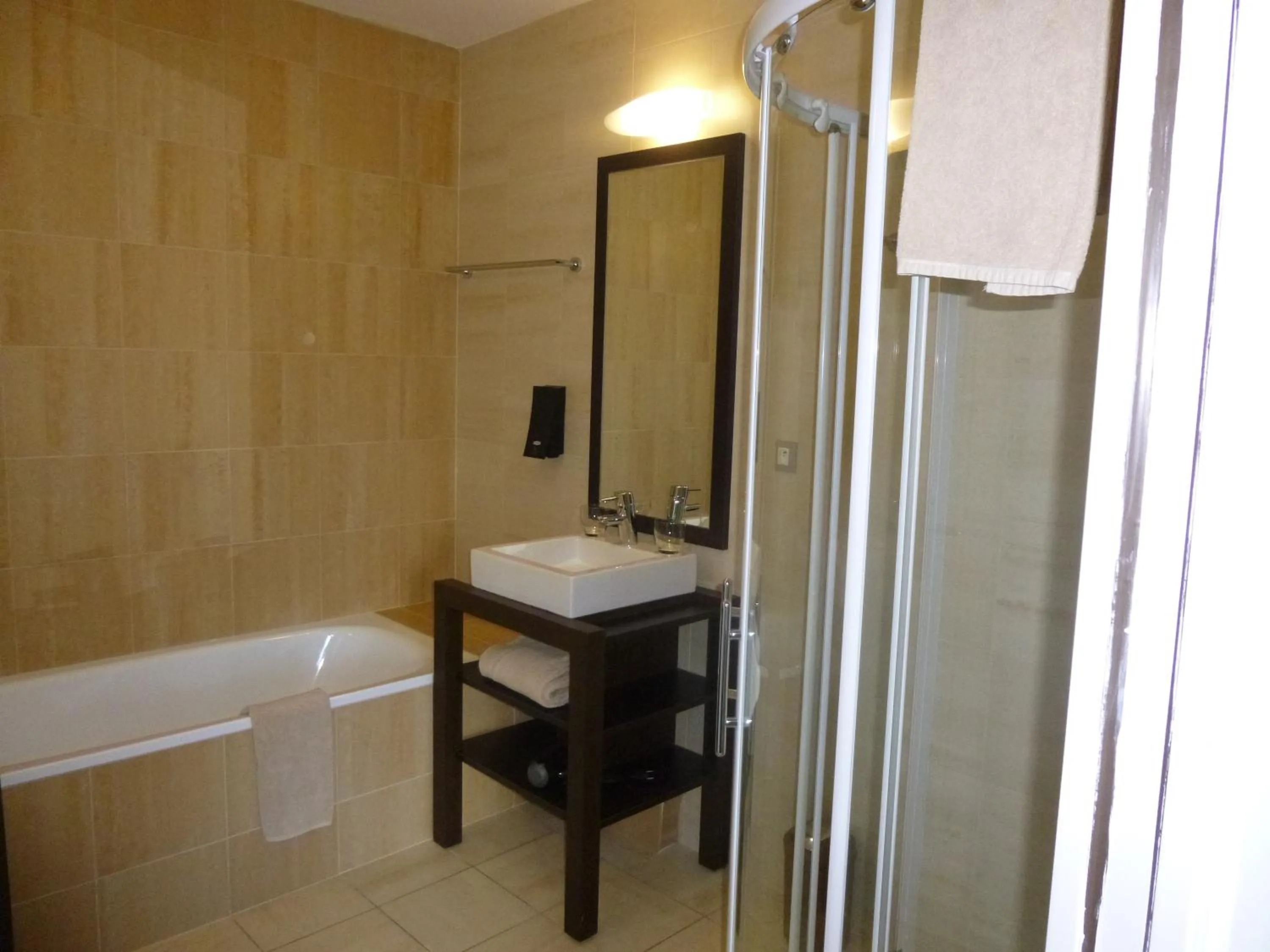 Bathroom in Logis Hôtel Terre de Loire